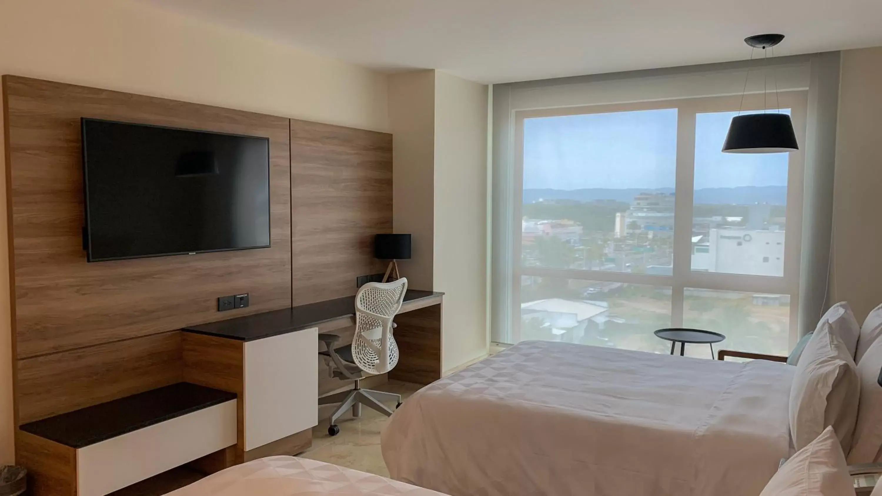 Photo of the whole room, Bed in Holiday Inn & Suites - Puerto Vallarta Marina & Golf, an IHG Hotel