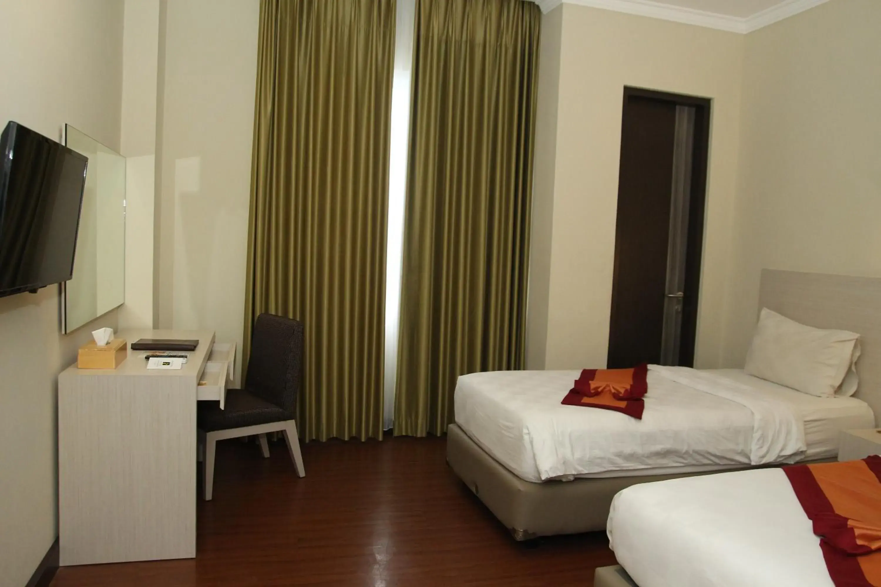 Bed in Grand Q Hotel Gorontalo