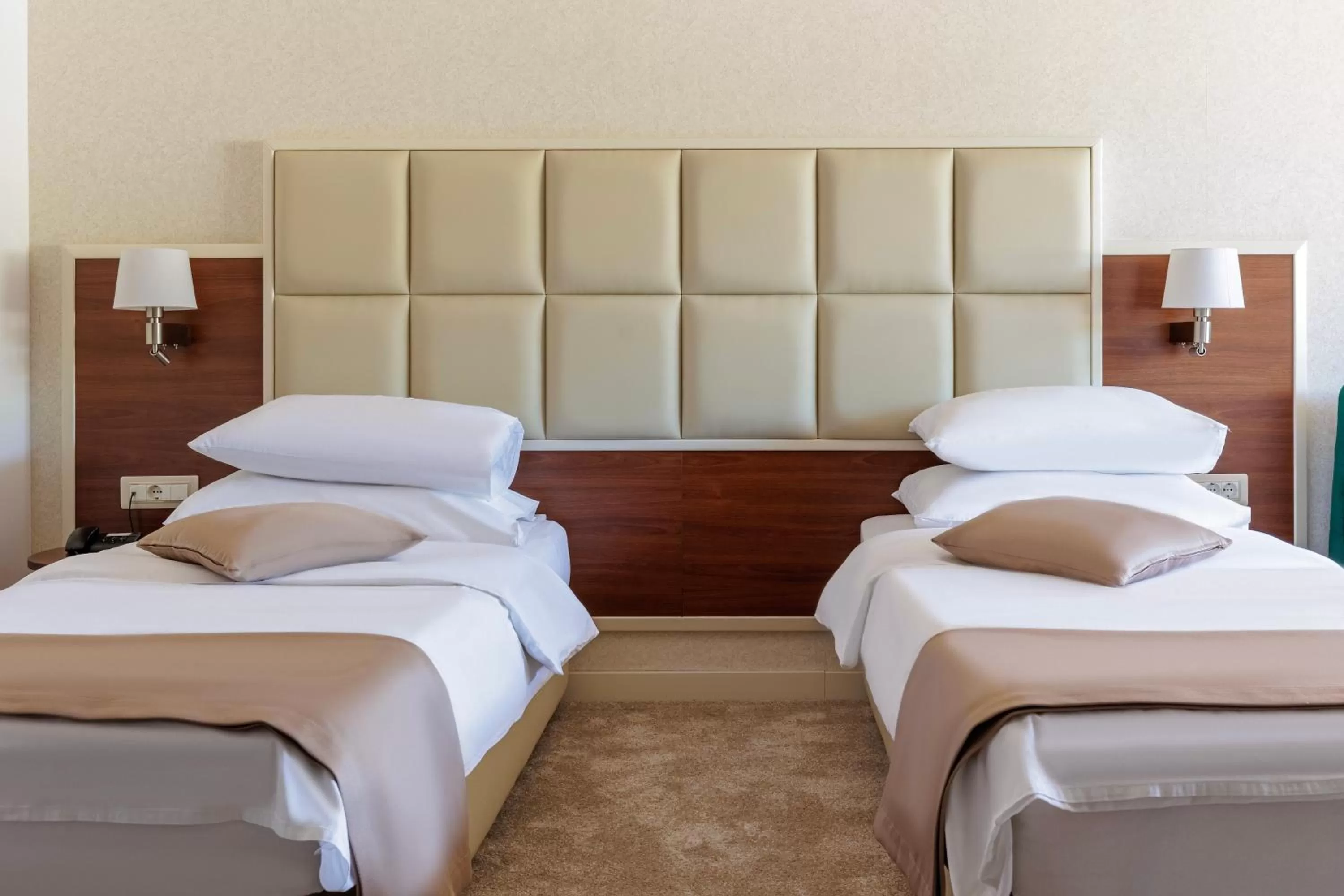 Bed in Hotel Kadmo by Aycon