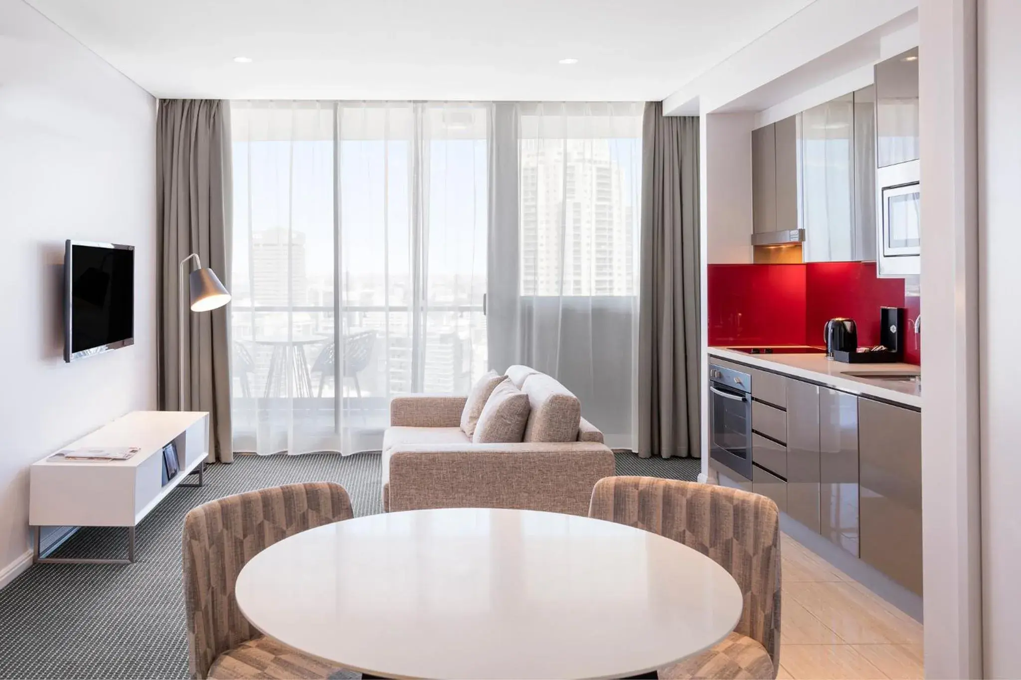 TV and multimedia, Seating Area in Meriton Suites Campbell Street, Sydney