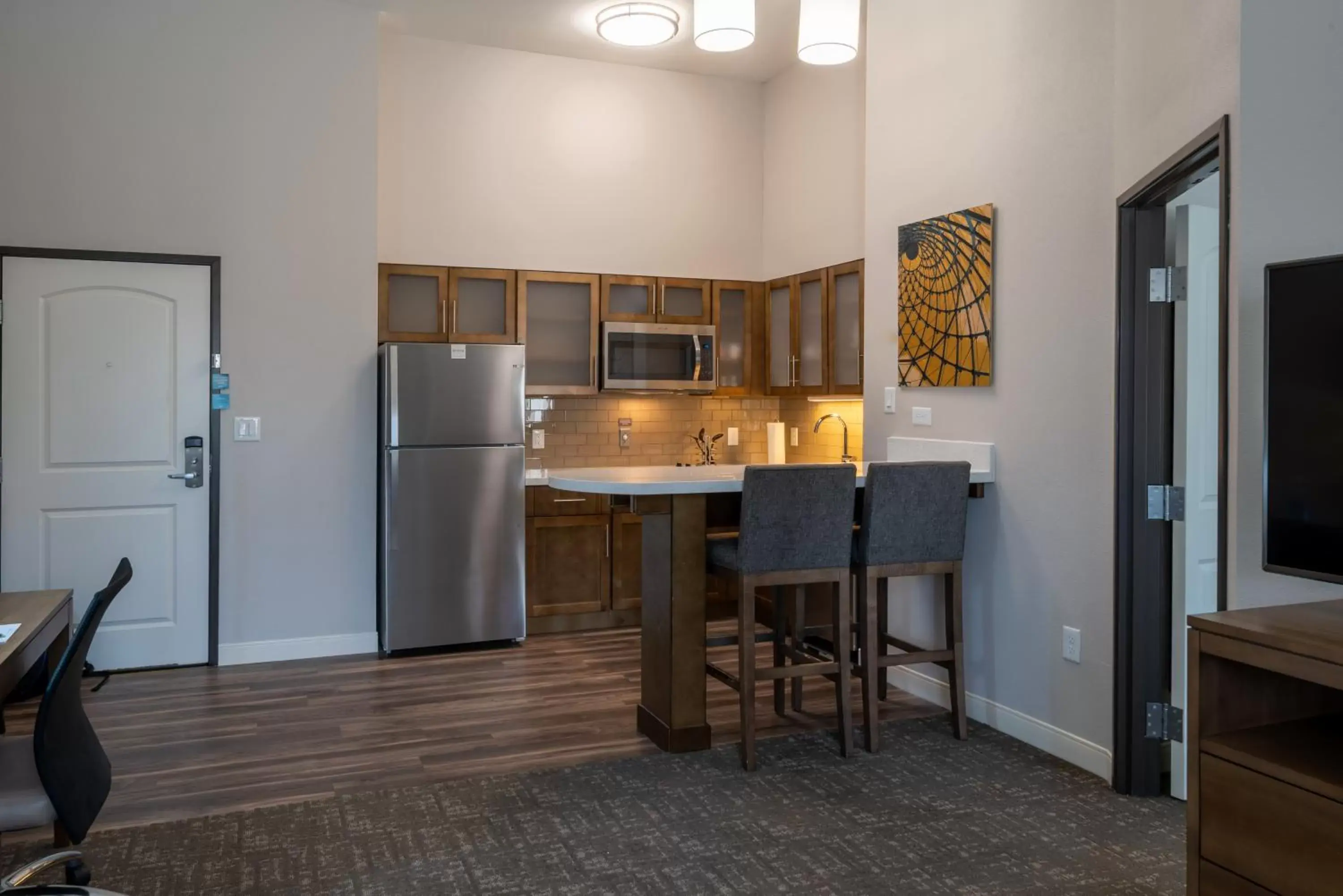 Kitchen/Kitchenette in Staybridge Suites Houston East - Baytown, an IHG Hotel