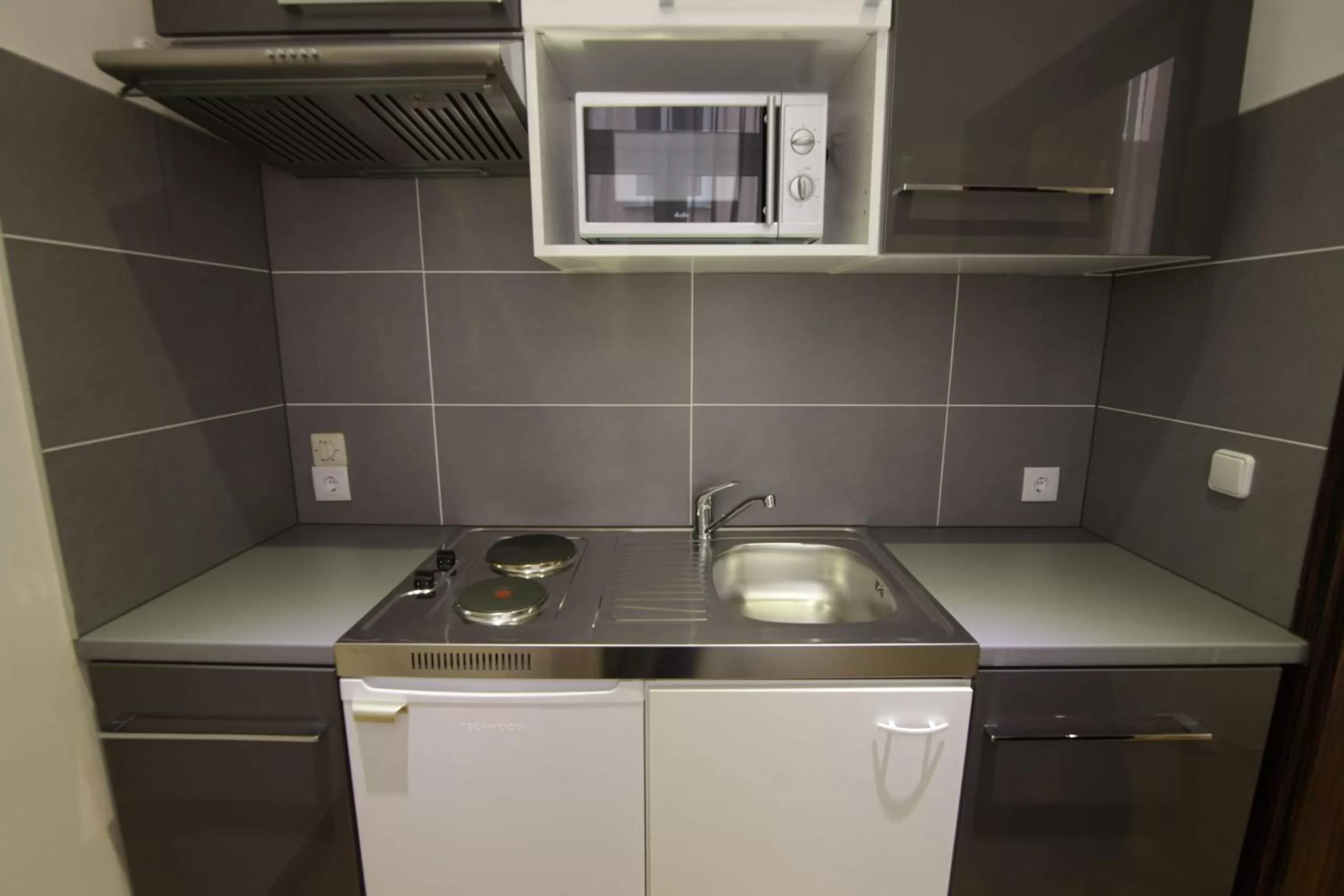 Kitchen or kitchenette in Best Western Plus Hotel Arcadia