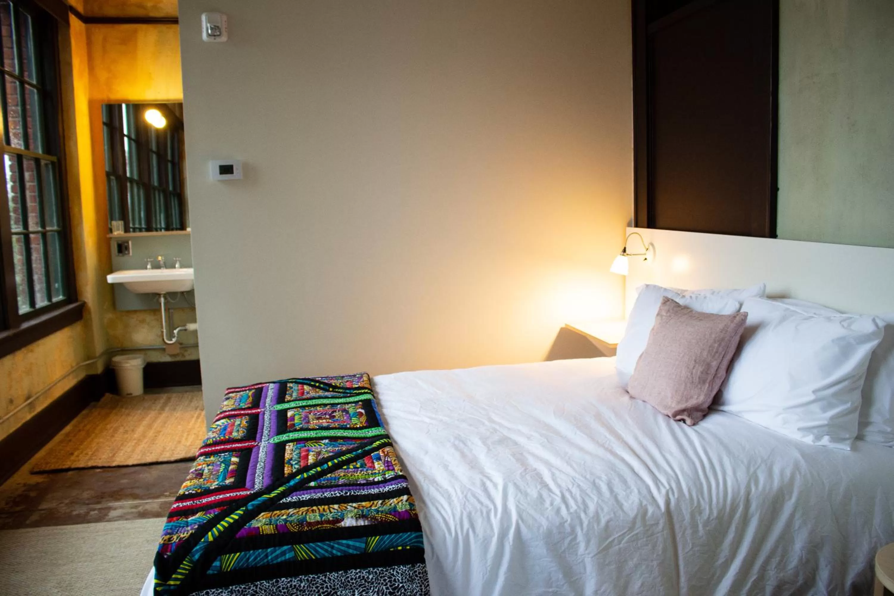 Bed in Travelers Hotel