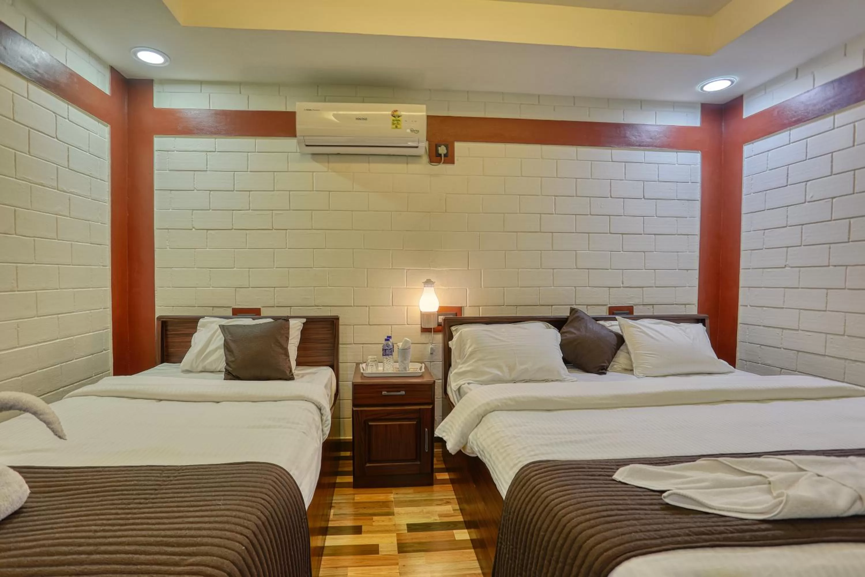 Bed in LEISURE VALLEY BEACH RESORT