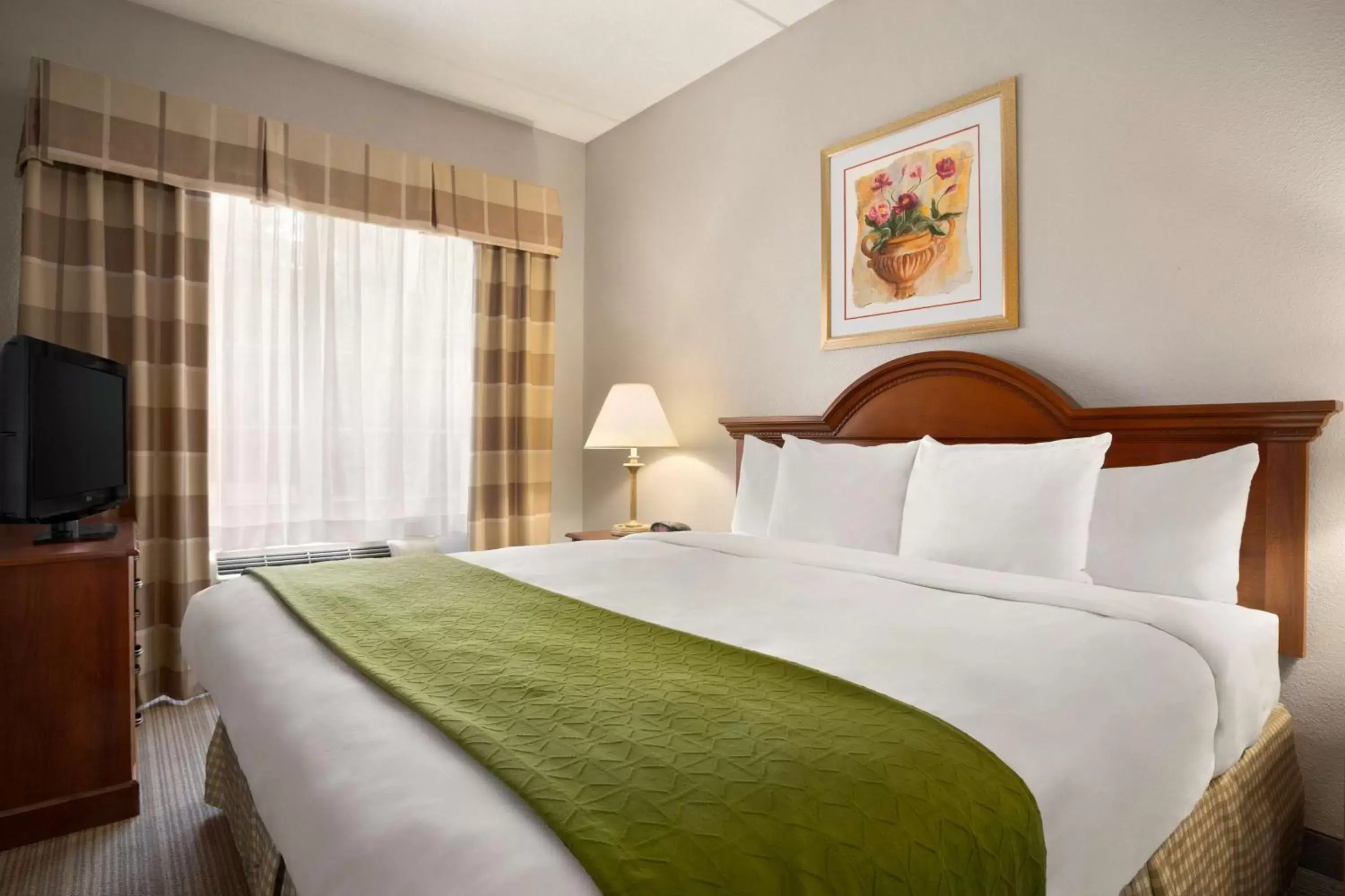 Bed in Country Inn & Suites by Radisson, Charlotte University Place, NC