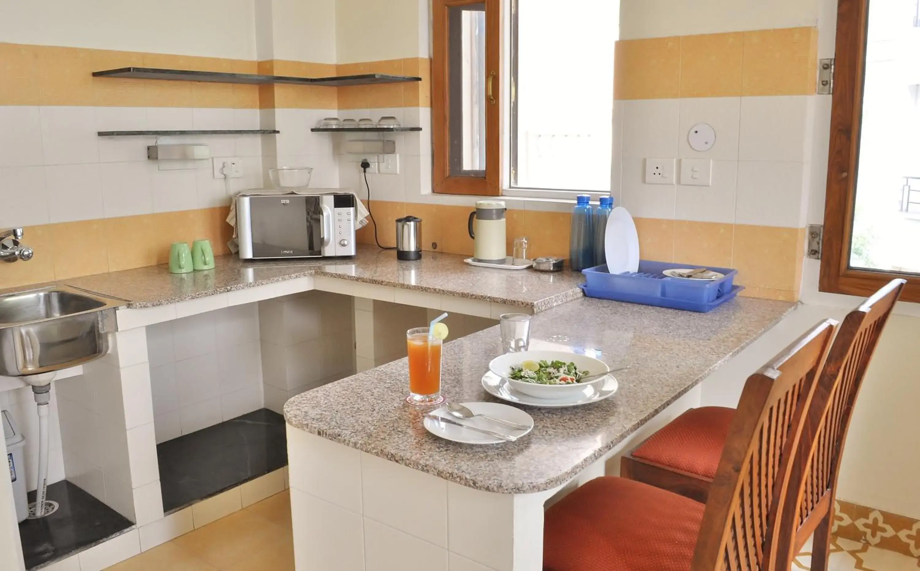 Kitchen or kitchenette, Kitchen/Kitchenette in Om Niwas Suite Hotel