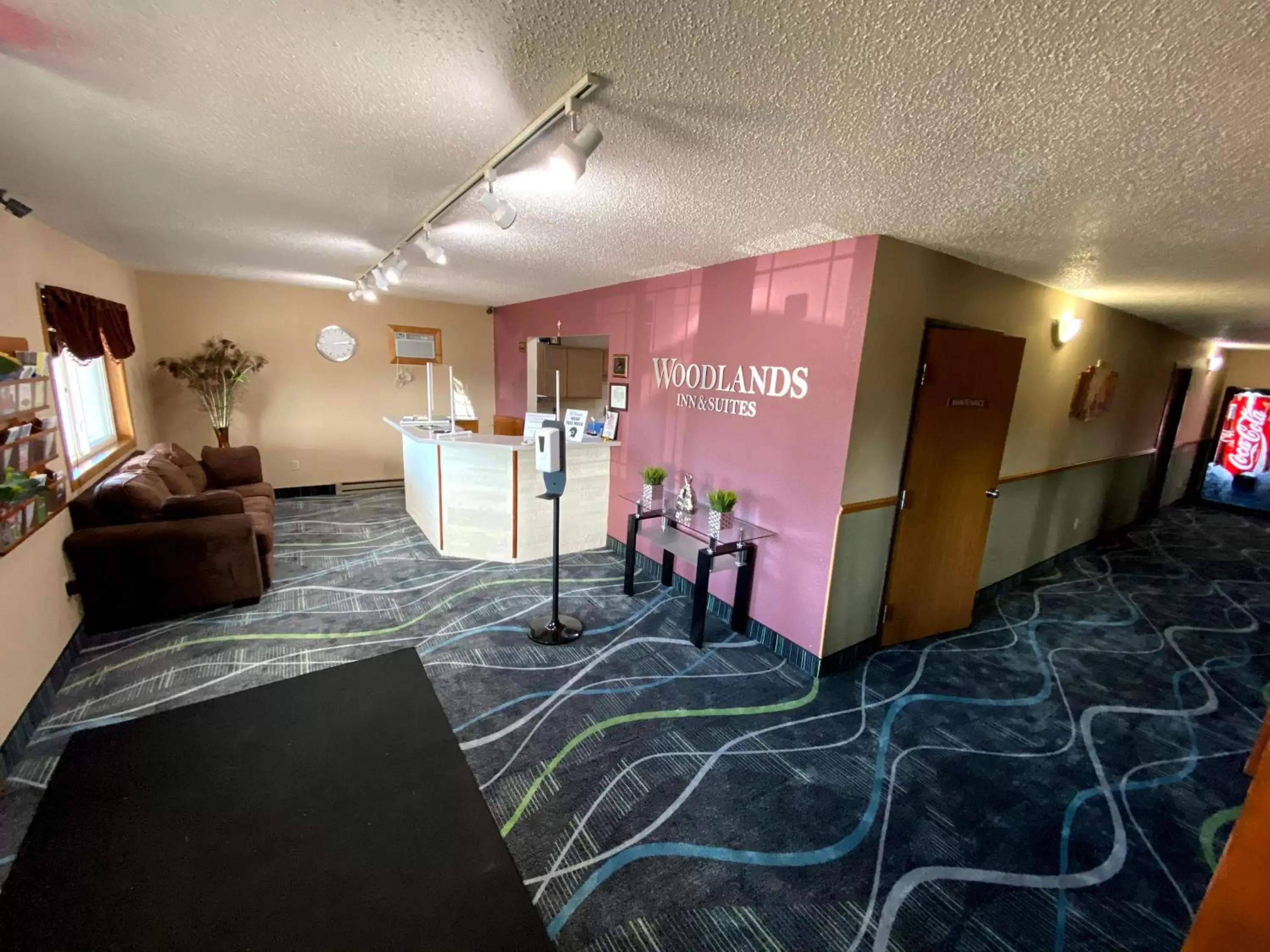 Lobby or reception in Woodland Inn & Suites