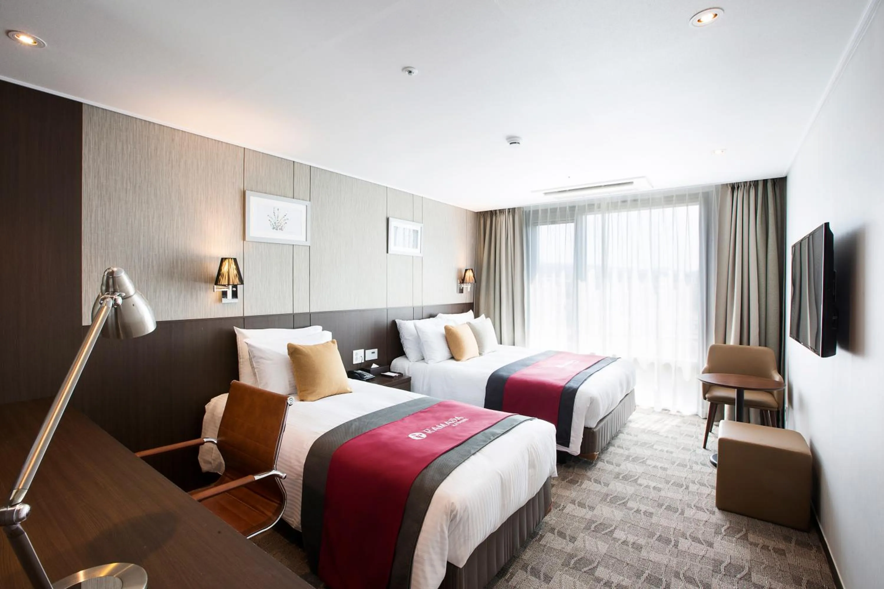 Bed in Ramada by Wyndham Jeju City Hall