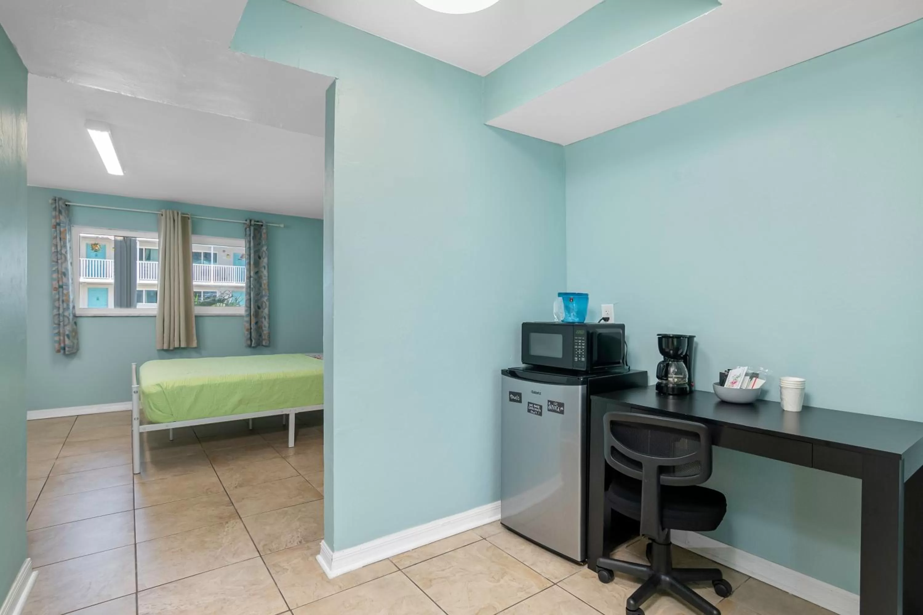 Bed in Latitude 26 Waterfront Resort and Marina