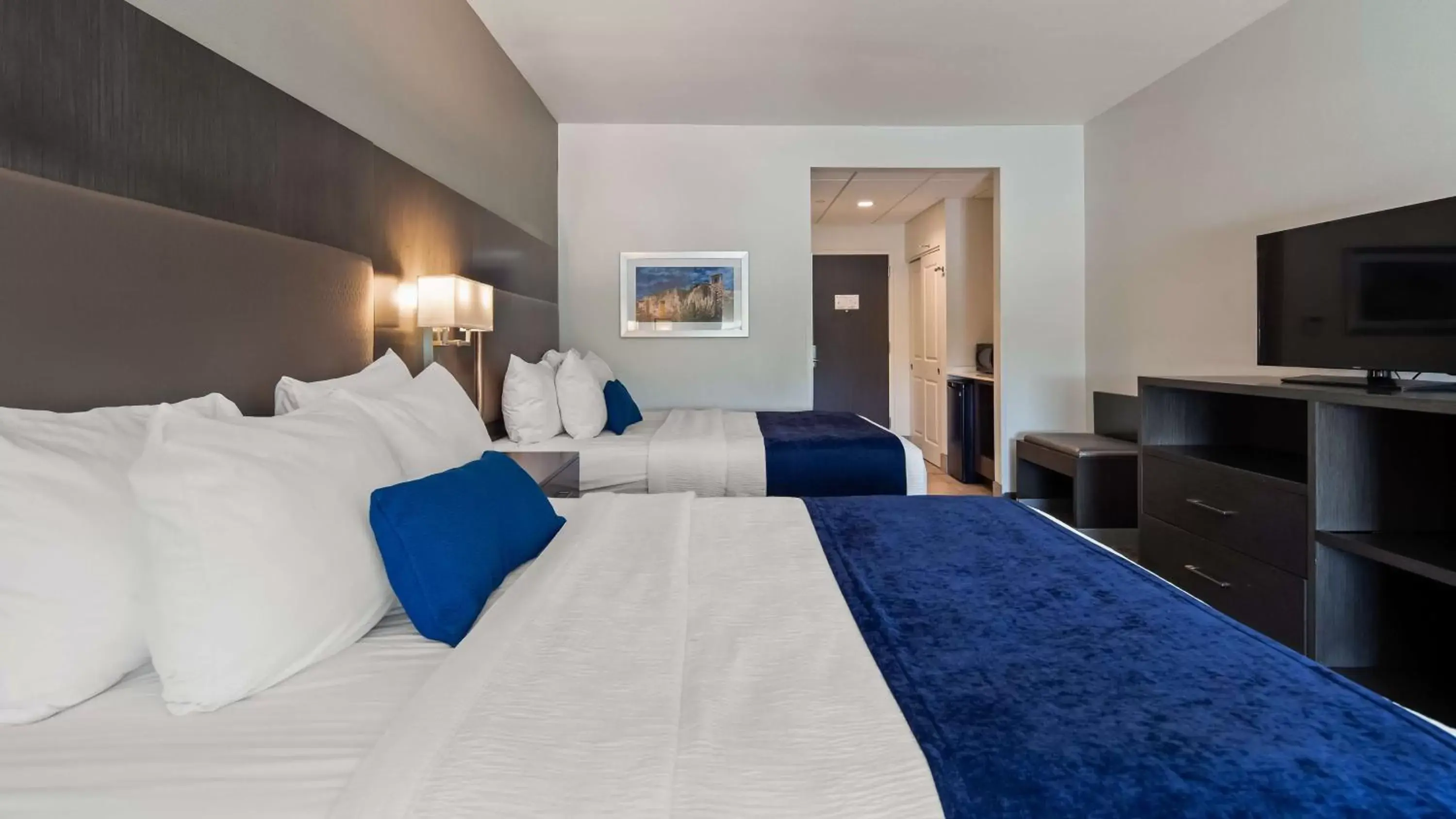 Queen Room with Two Queen Beds and Bath Tub - Disability Access in Best Western Plus Roland Inn & Suites Queen Room with Two Queen Beds and Bath Tub - Disability Access in Best Western Plus Roland Inn & Suites