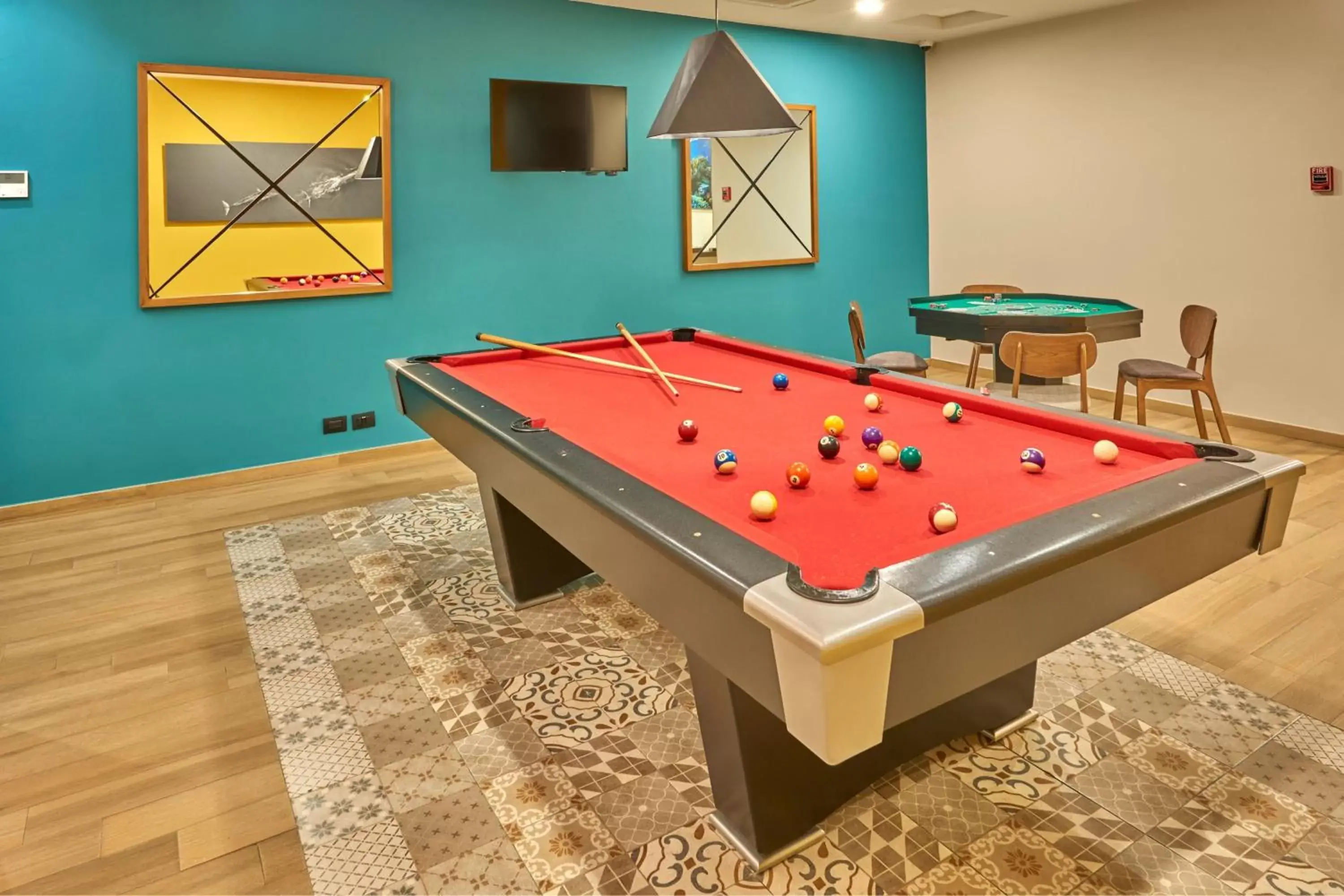 Swimming pool, Billiards in City Express Suites by Marriott Cabo San Lucas