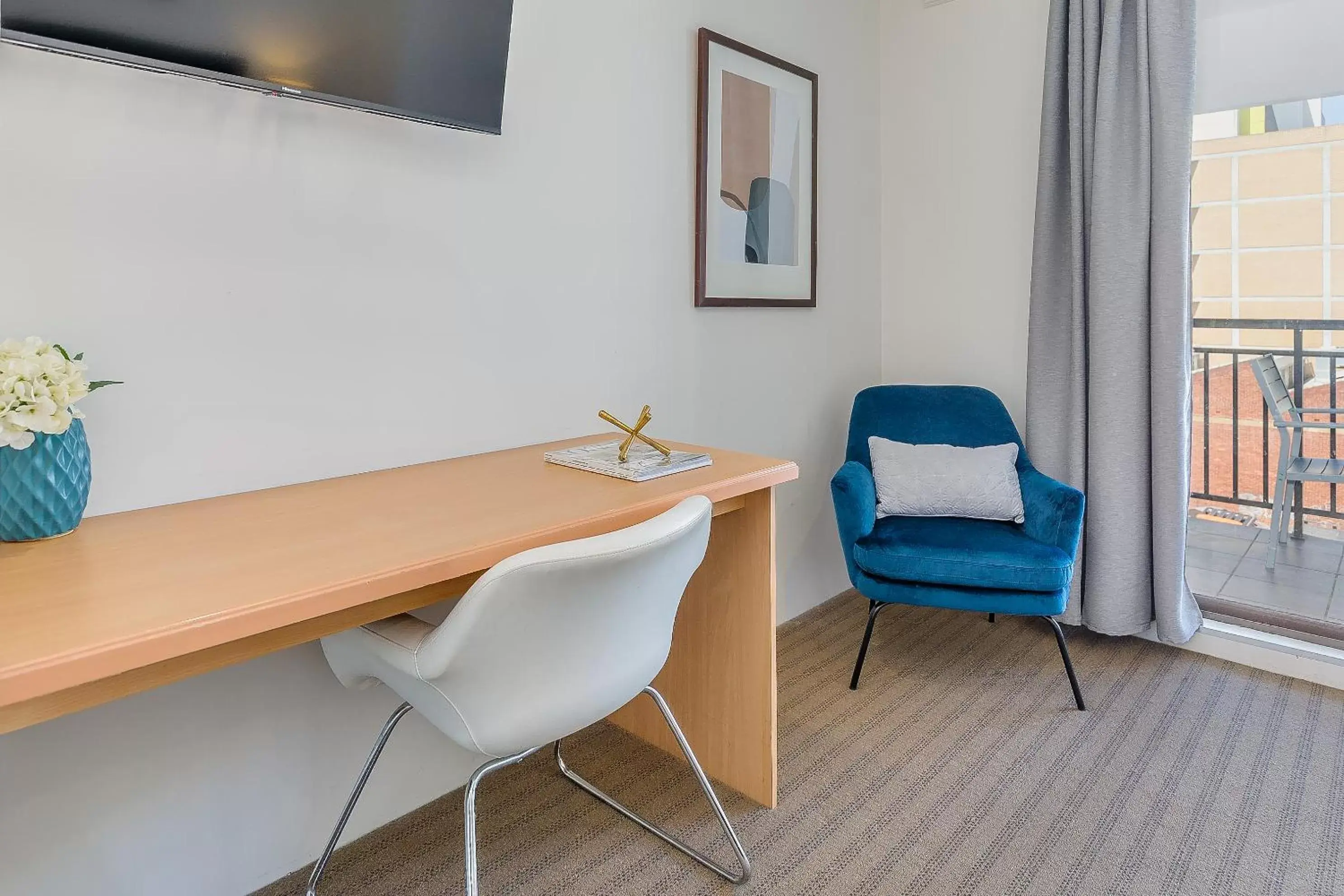 Bedroom, Seating Area in All Suites Perth