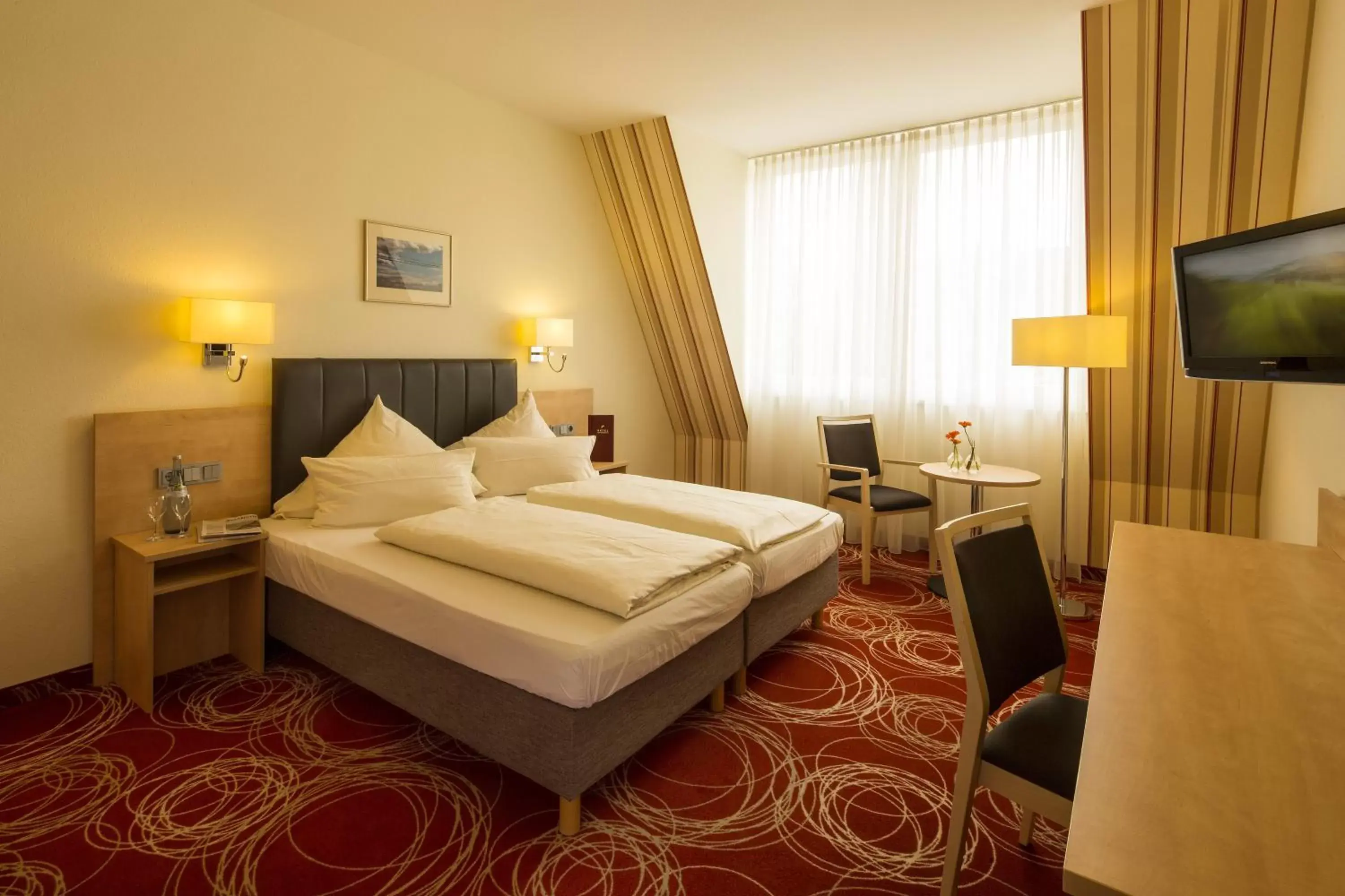 Photo of the whole room, Bed in Hotel Löwengarten Photo of the whole room, Bed in Hotel Löwengarten