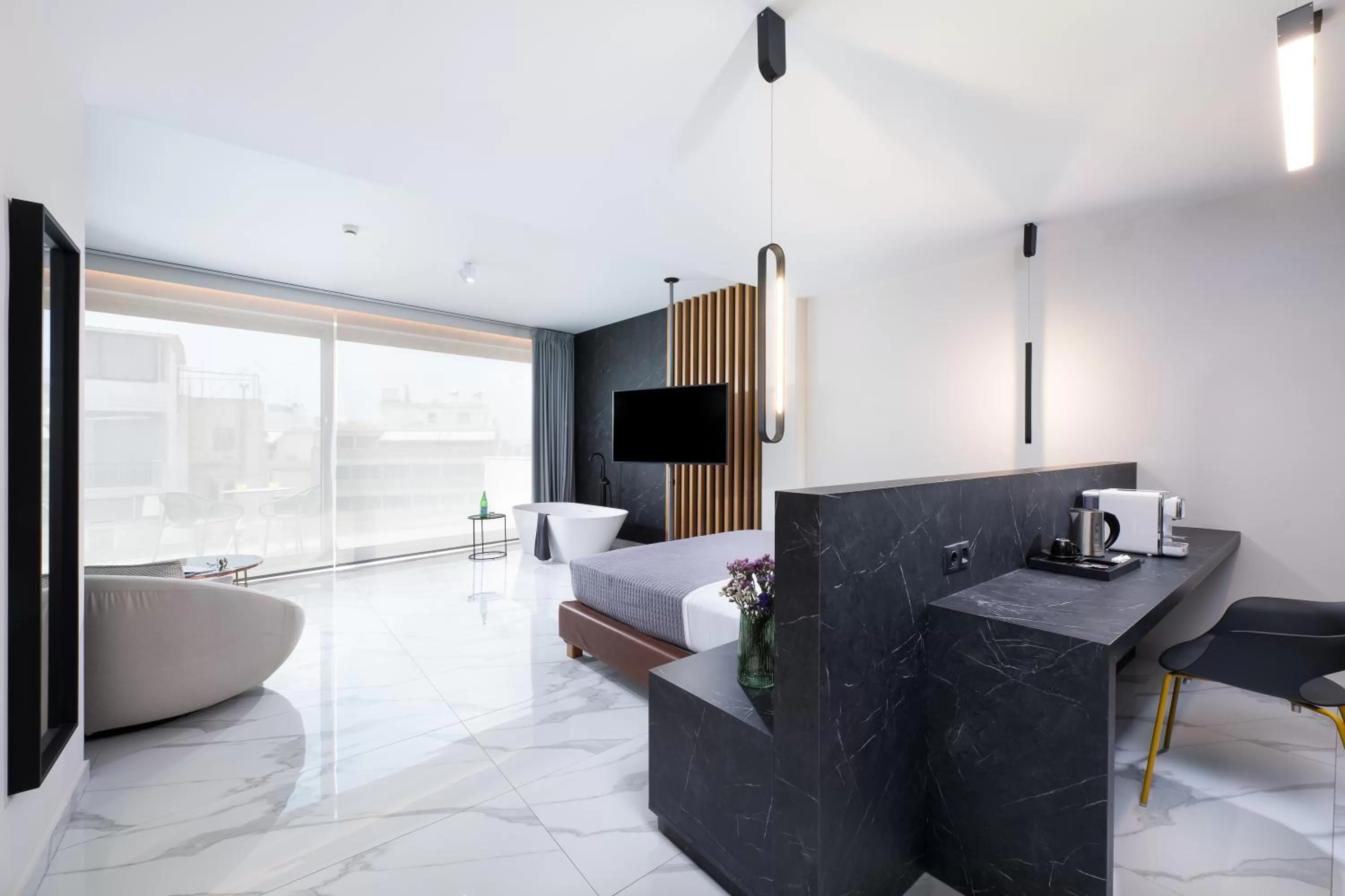 Bedroom in Enattica Suites