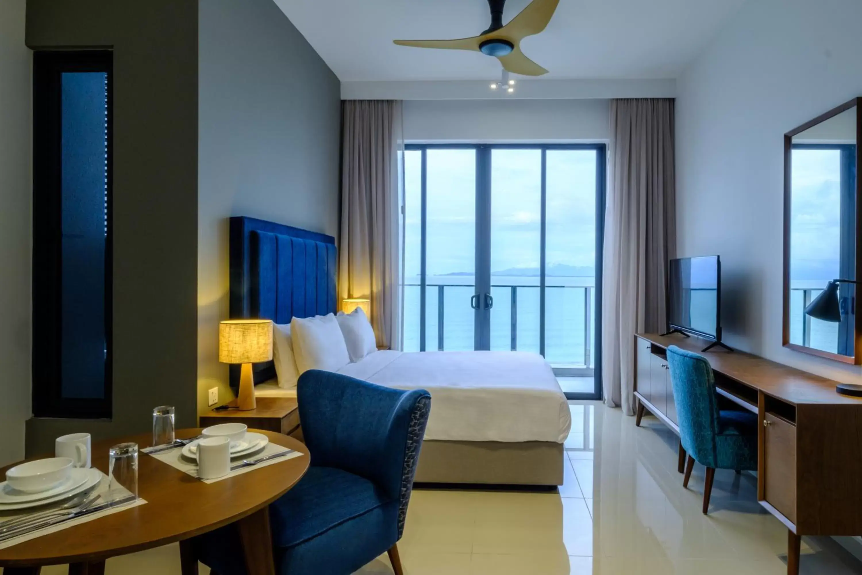 Bed, Seating Area in Tanjung Point Residences