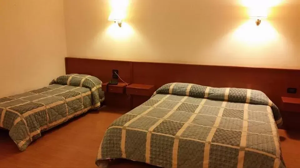 Bed in Hotel Holiday