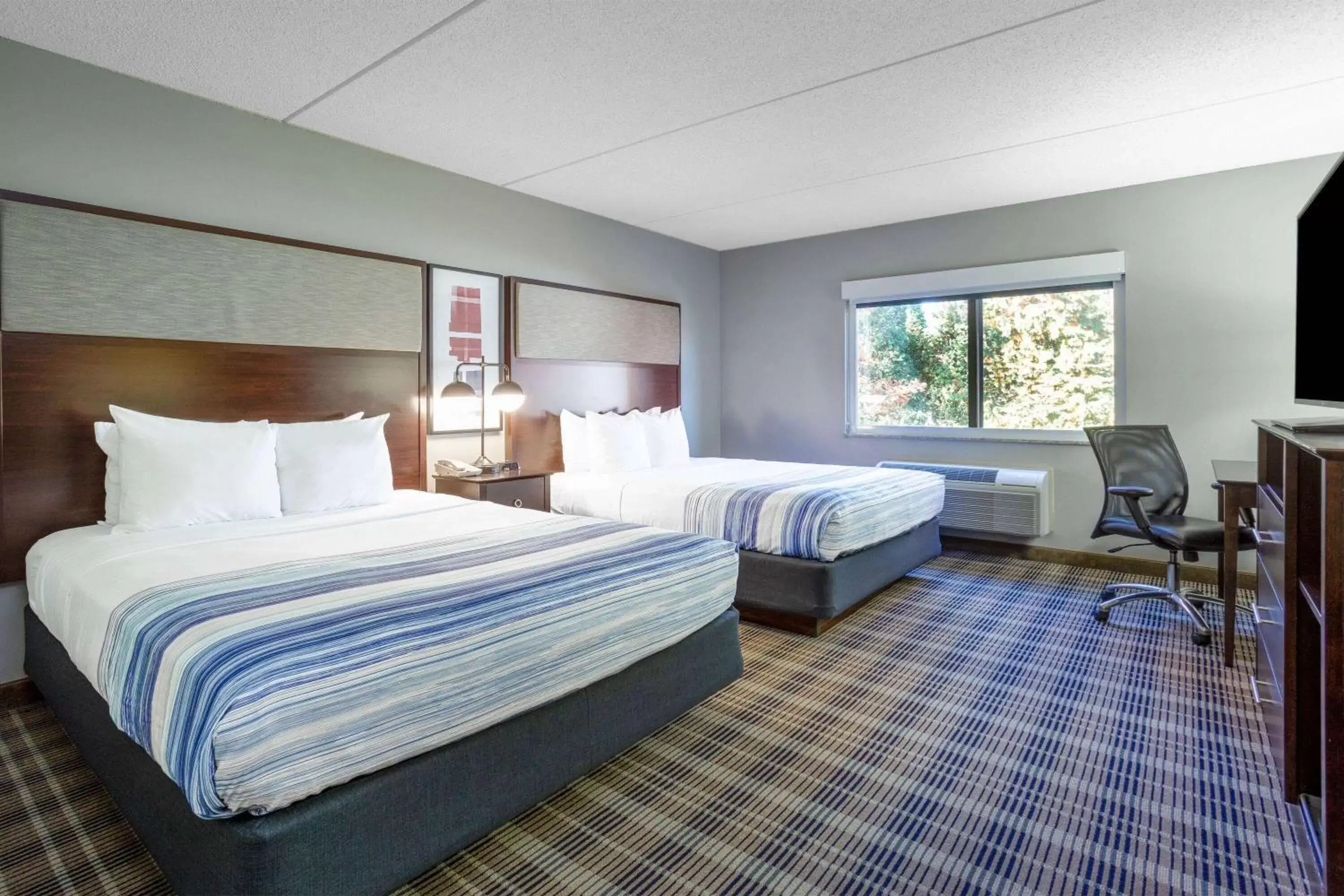 Photo of the whole room, Bed in AmericInn by Wyndham Madison South