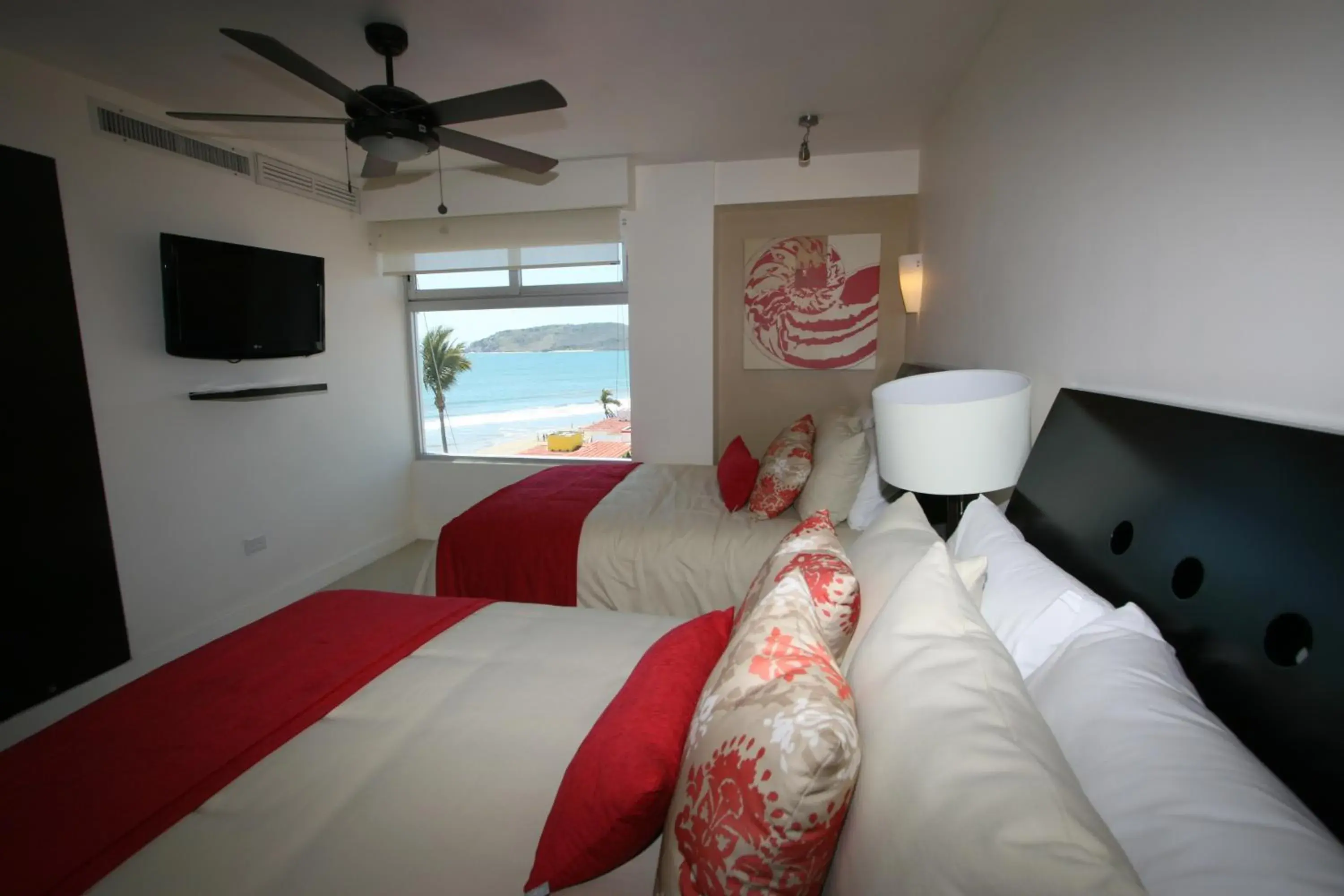 Bed in Las Flores Beach Resort