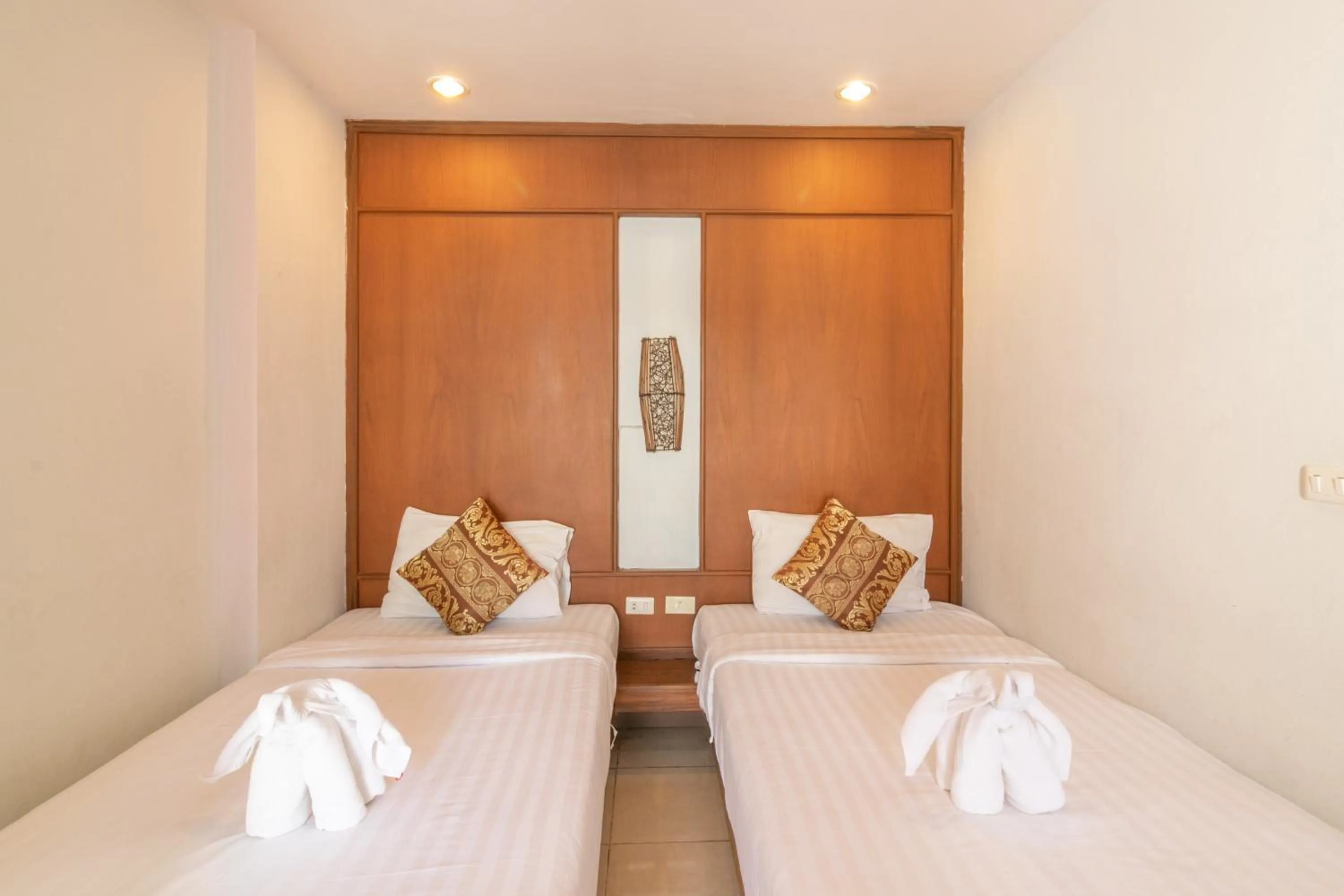 Bed in Lotus Hotel Patong