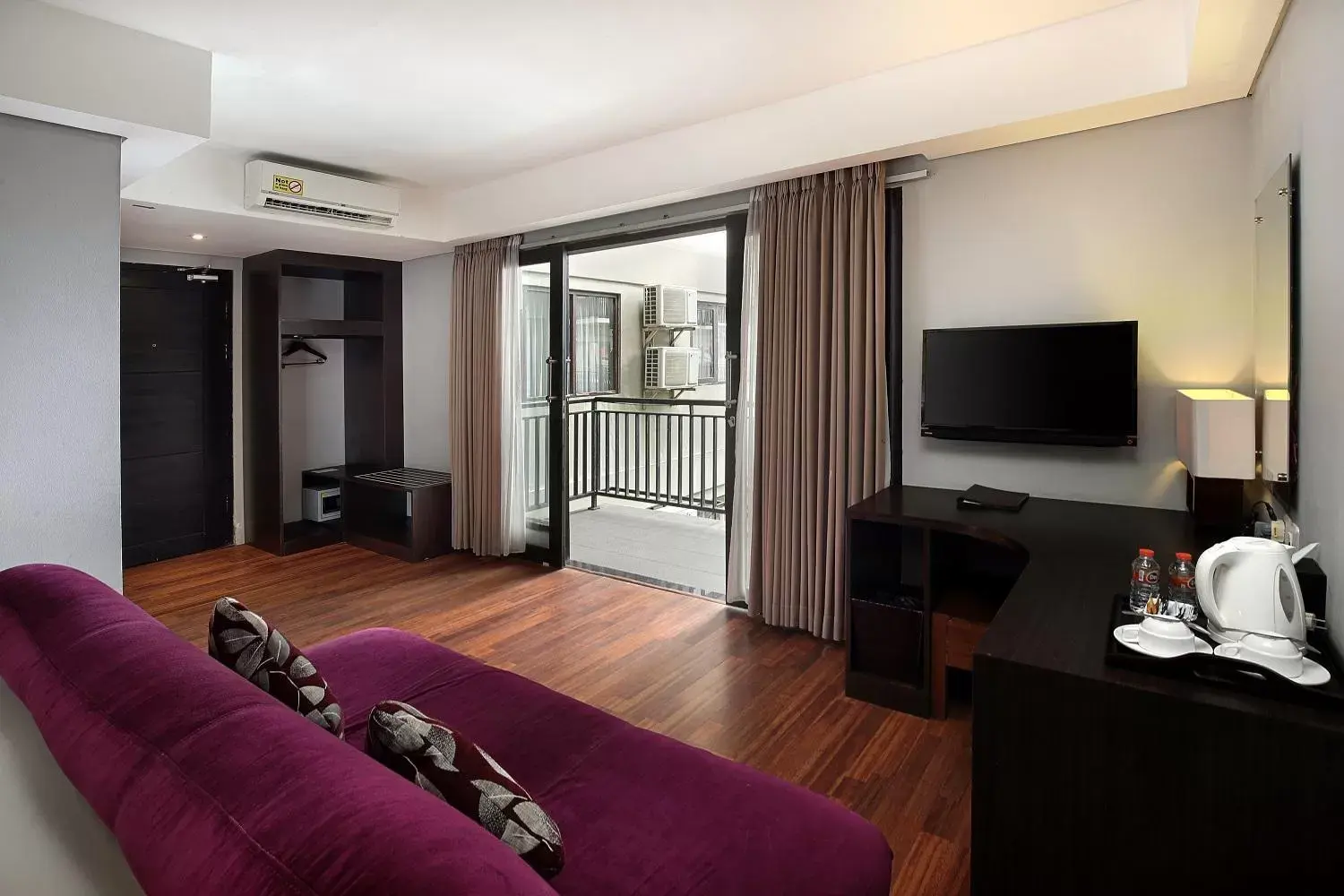 TV and multimedia, TV/Entertainment Center in Rofa Kuta Hotel - CHSE Certified