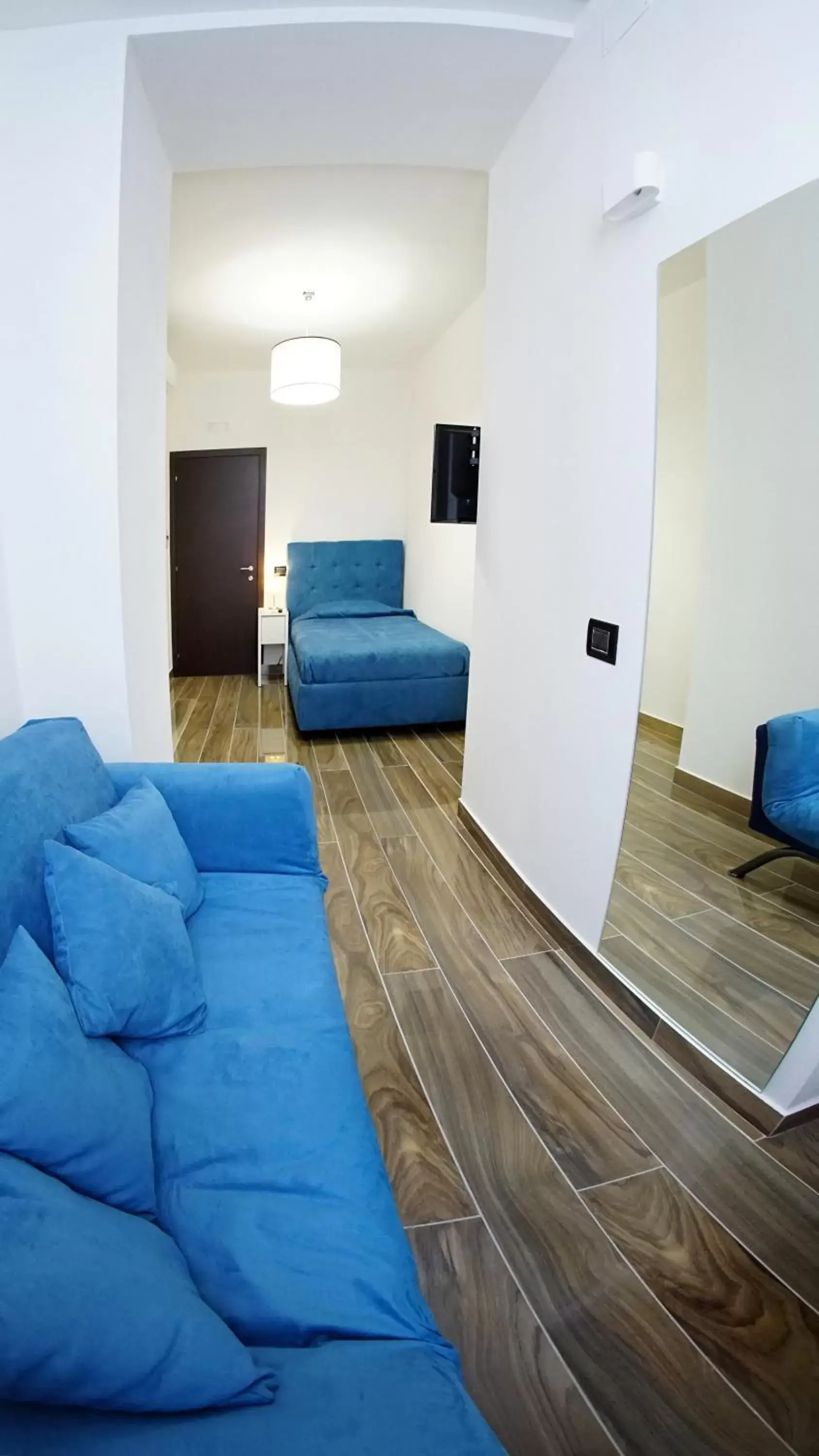 Bedroom, Seating Area in Beverello Suite