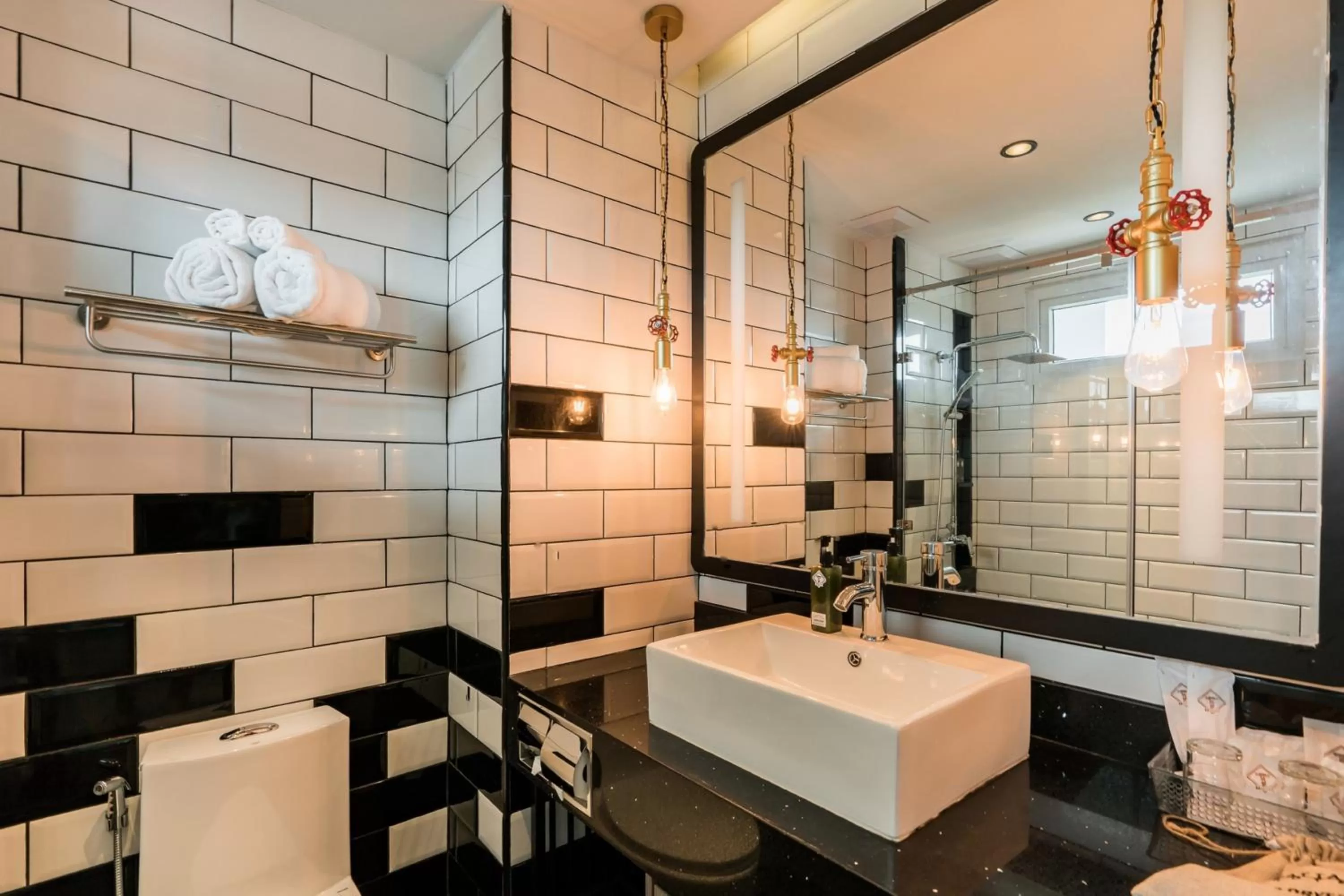 Bathroom in SureStay Plus by Best Western T Pattaya