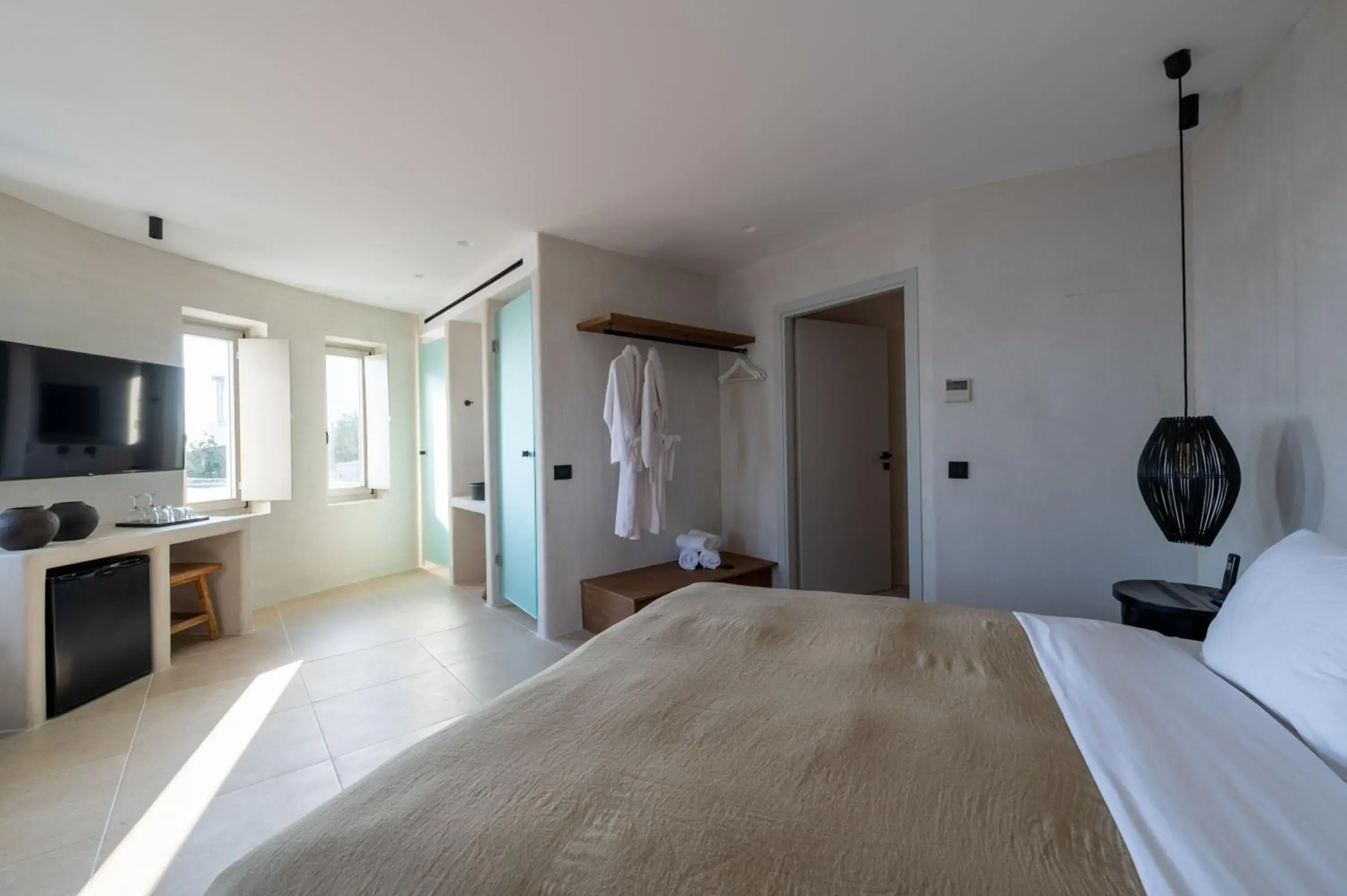Bed in Rocabella Mykonos Hotel