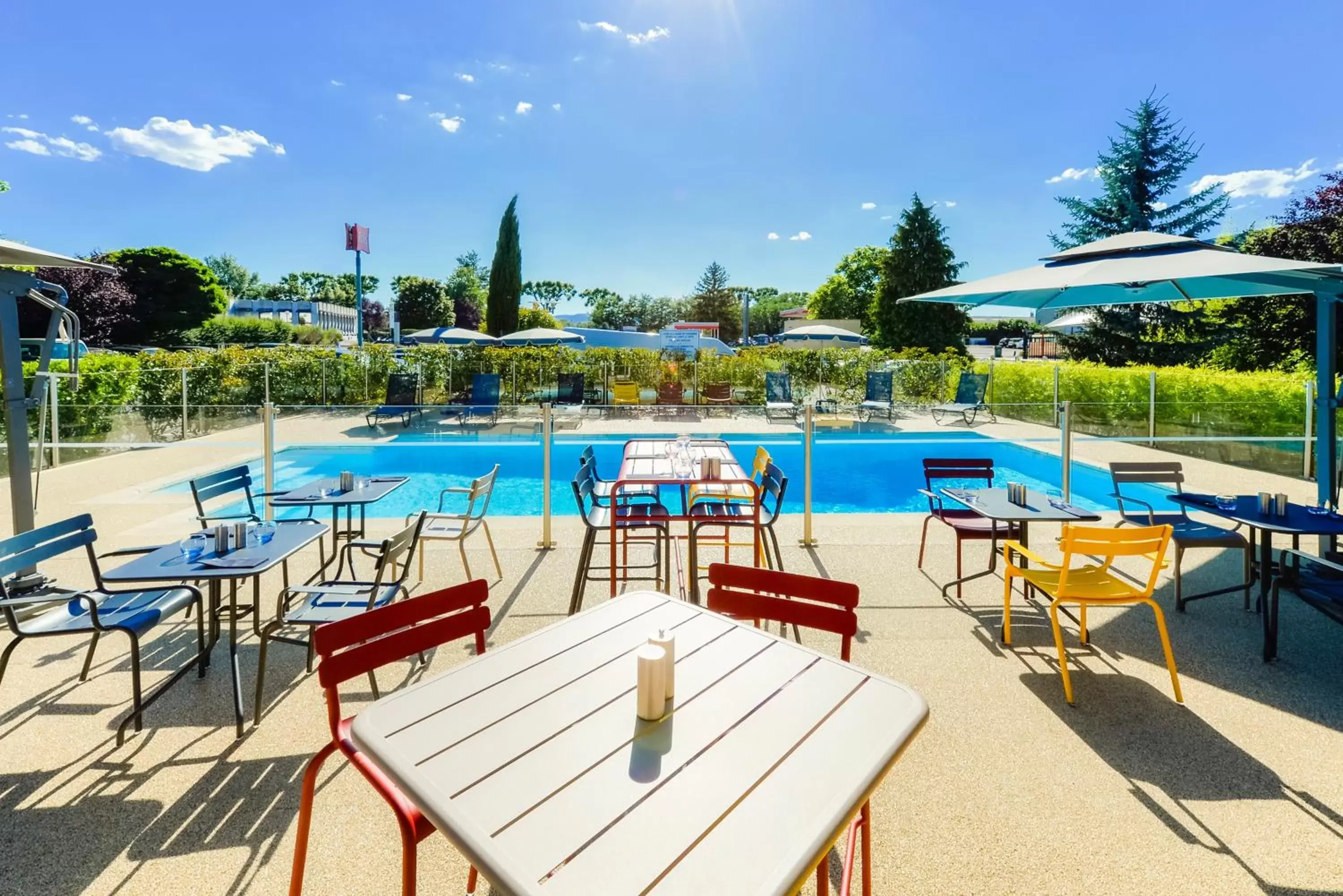 Patio, Swimming Pool in Ibis Roanne Le Coteau Hotel Restaurant
