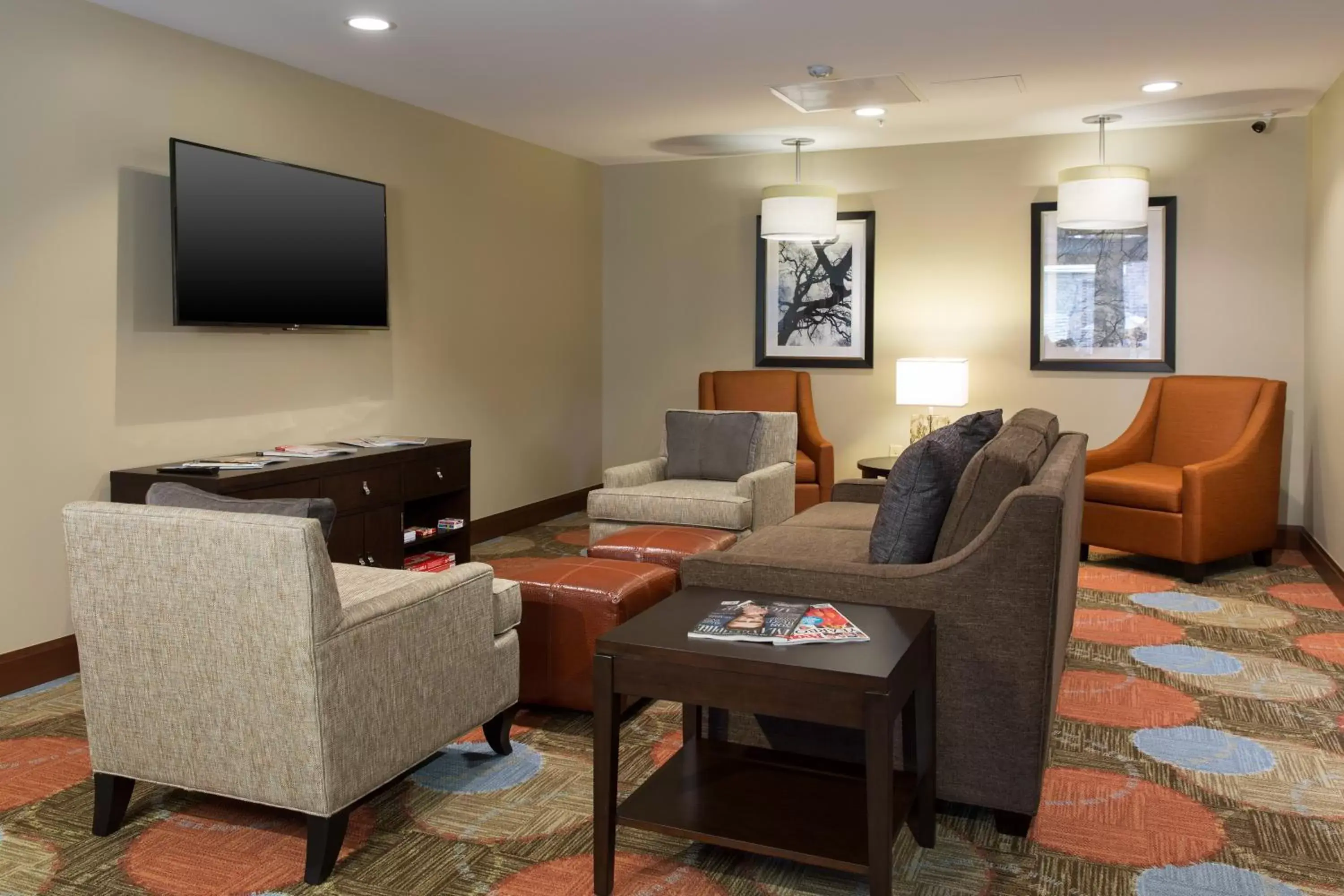 Lobby or reception, Seating Area in Staybridge Suites Corona South, an IHG Hotel