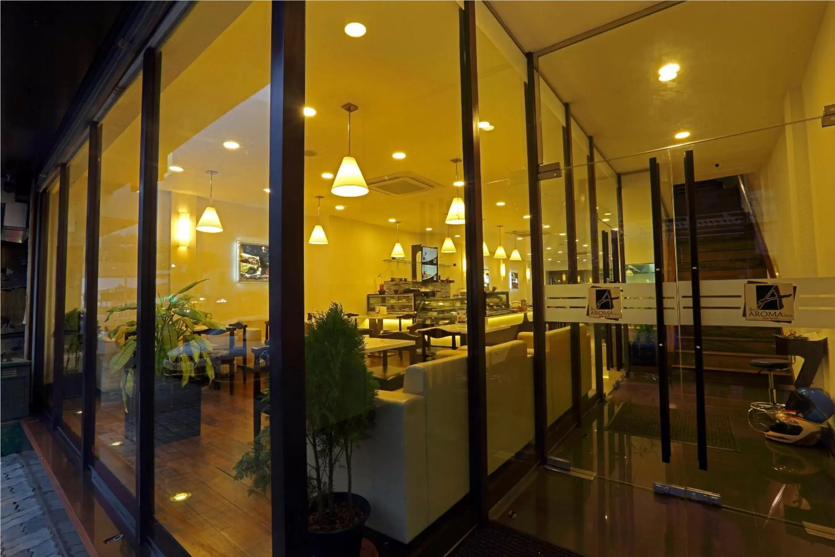 Facade/entrance in Cafe Aroma Inn