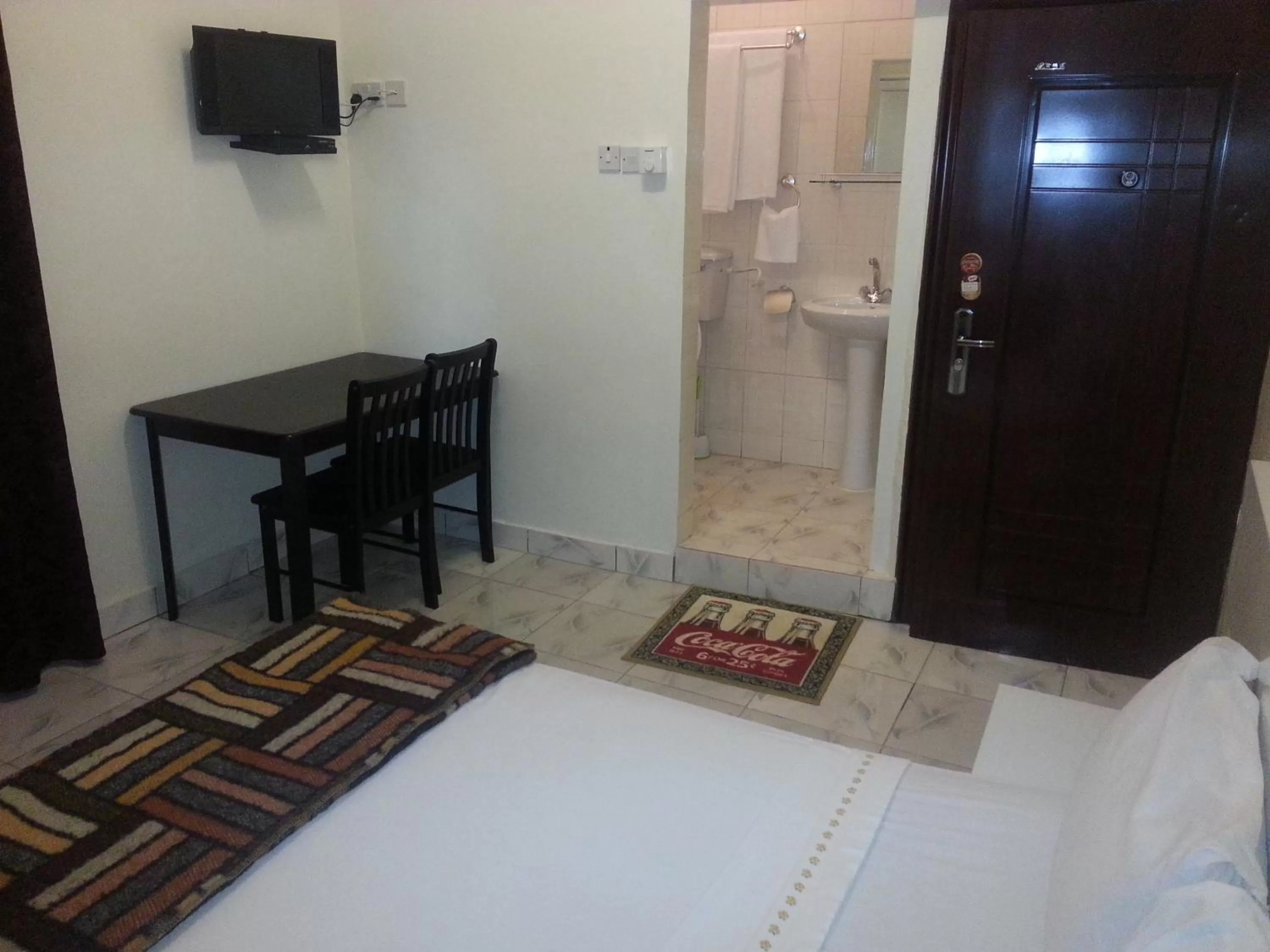 Bed in Woodpecker Resort Hotel