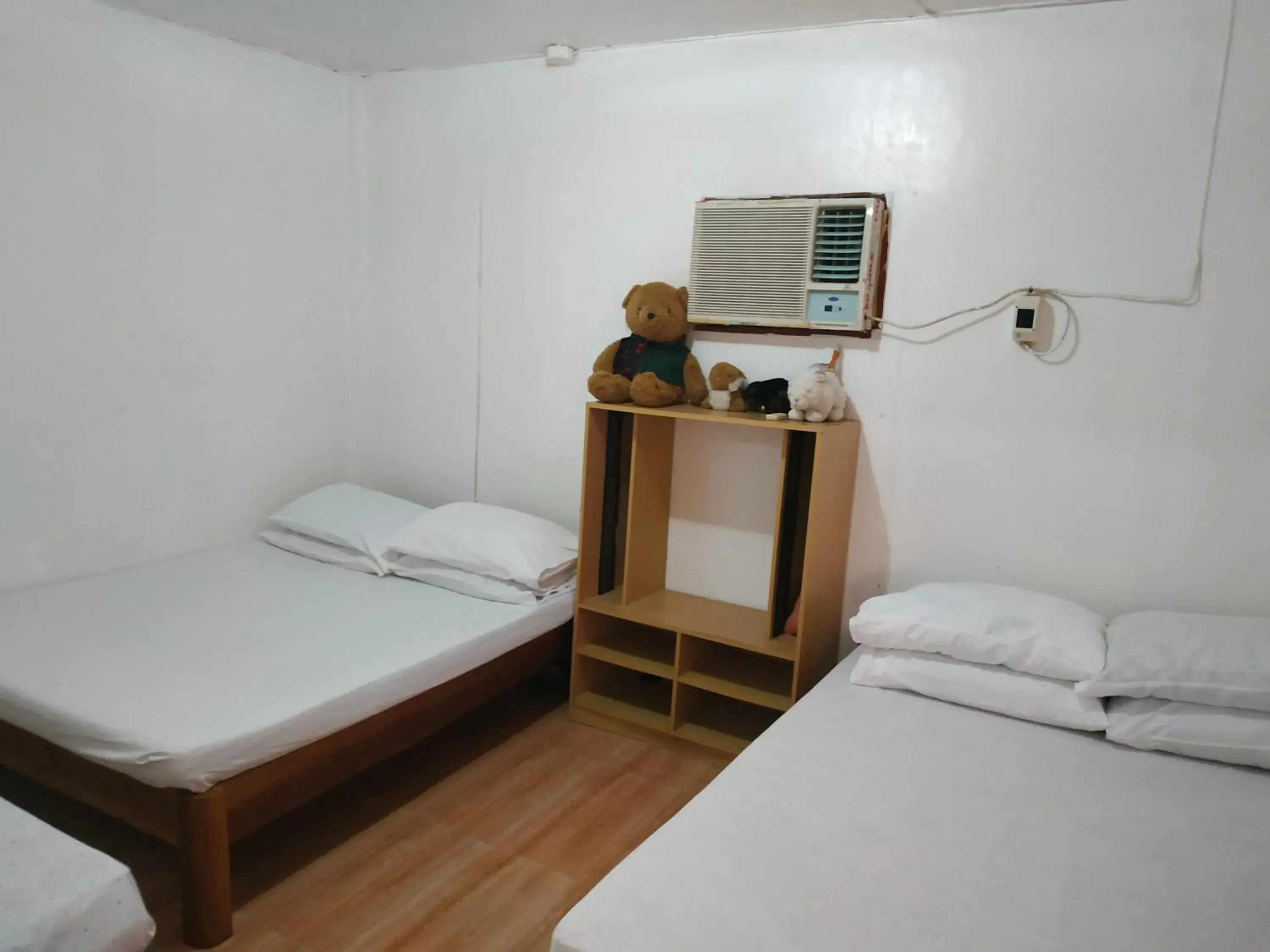 Bed in Emok's Guest House