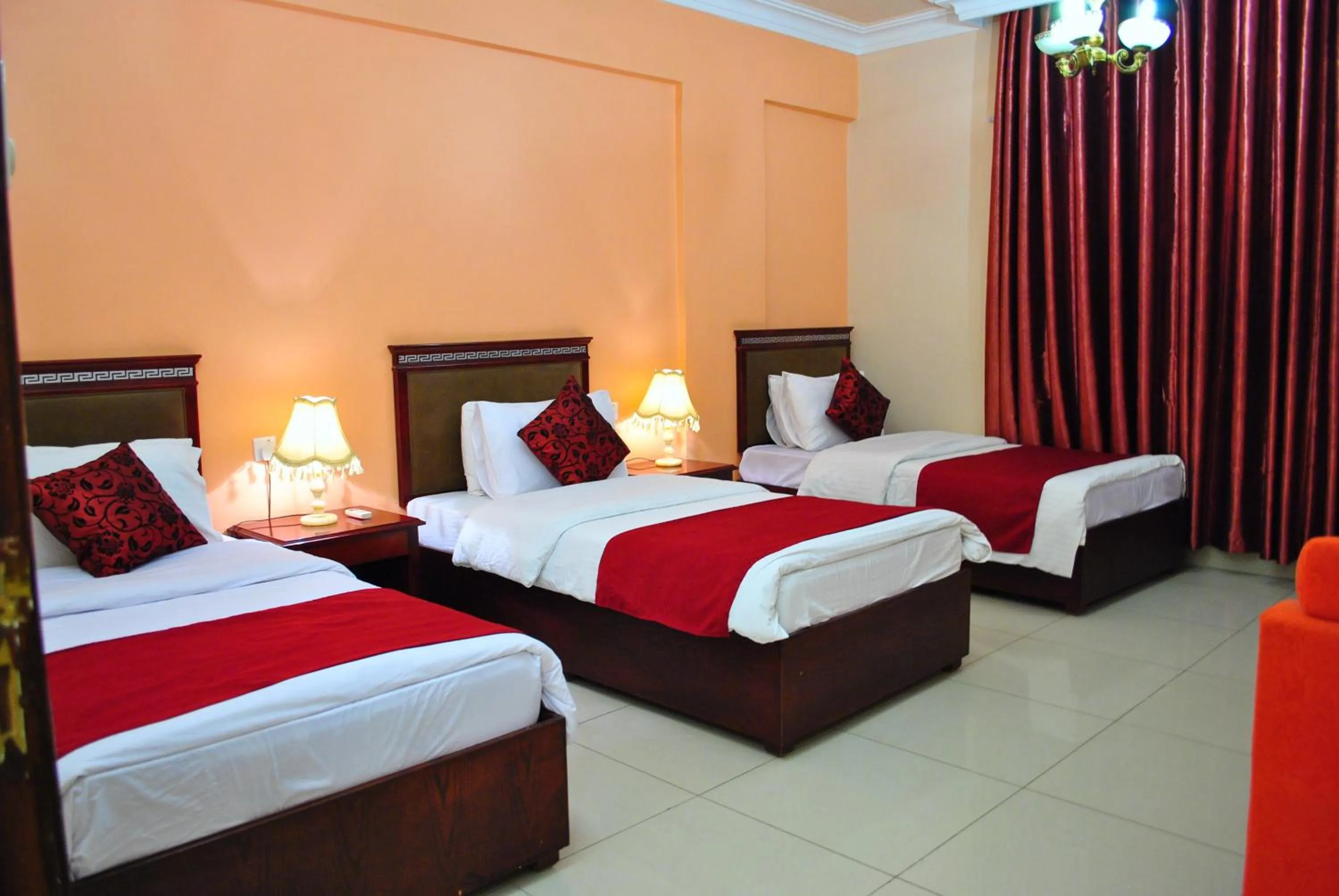 Bed in Al Qidra Hotel & Suites Aqaba
