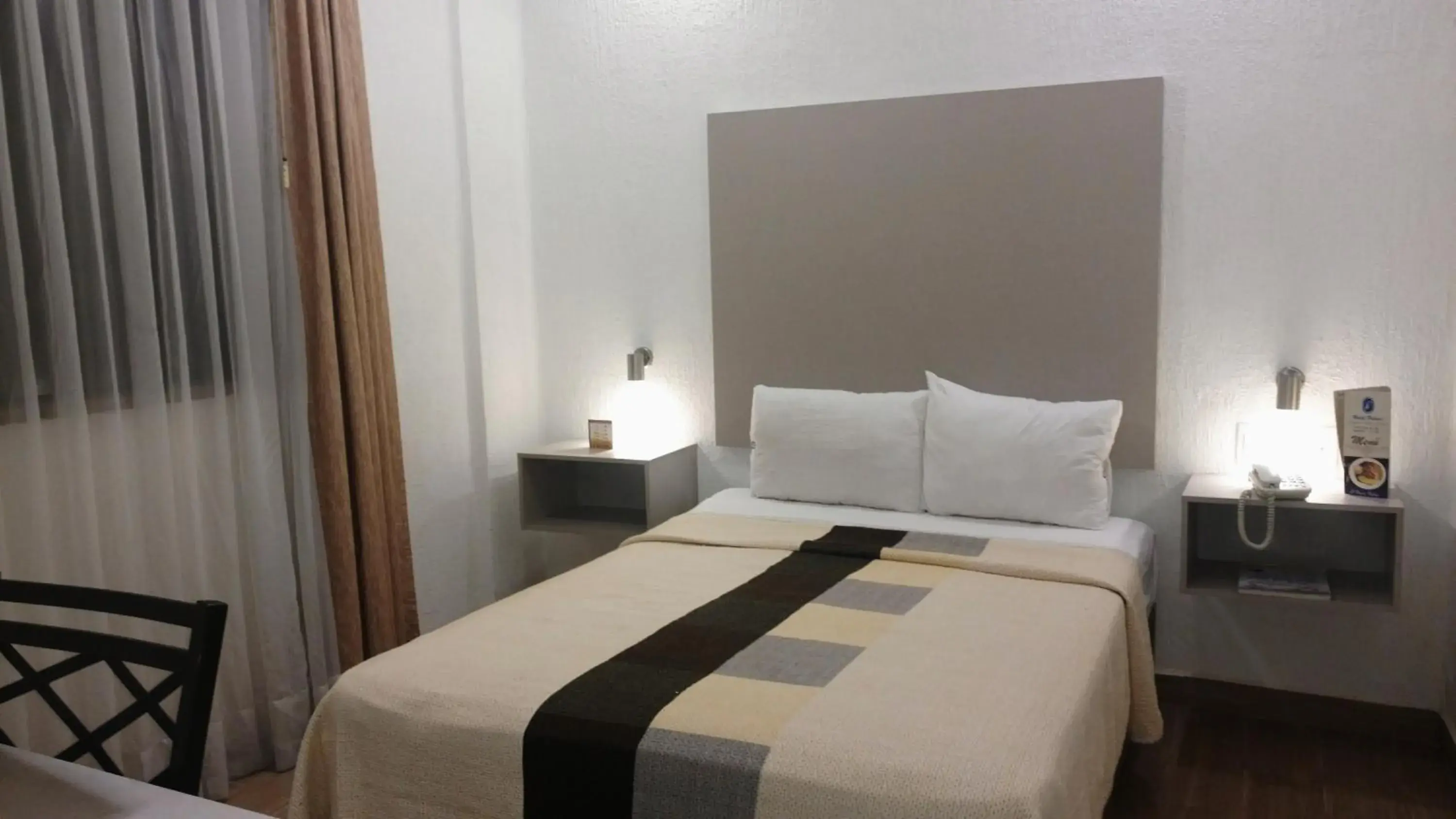 Bed in Hotel Palace Puebla