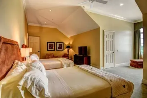 Bed in Cottages and Suites at River Landing