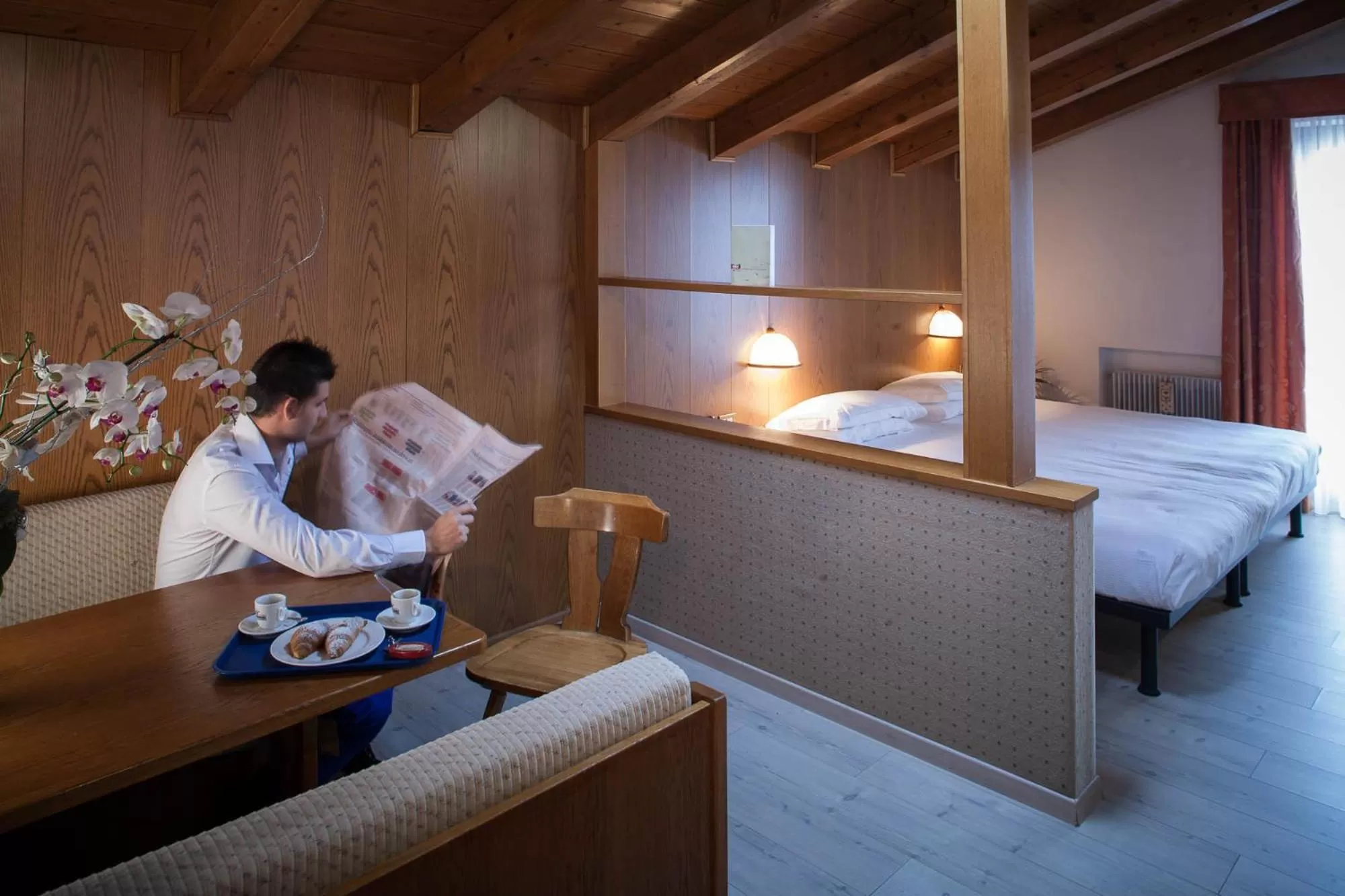 Seating area, Bed in Hotel Villaggio Nevada