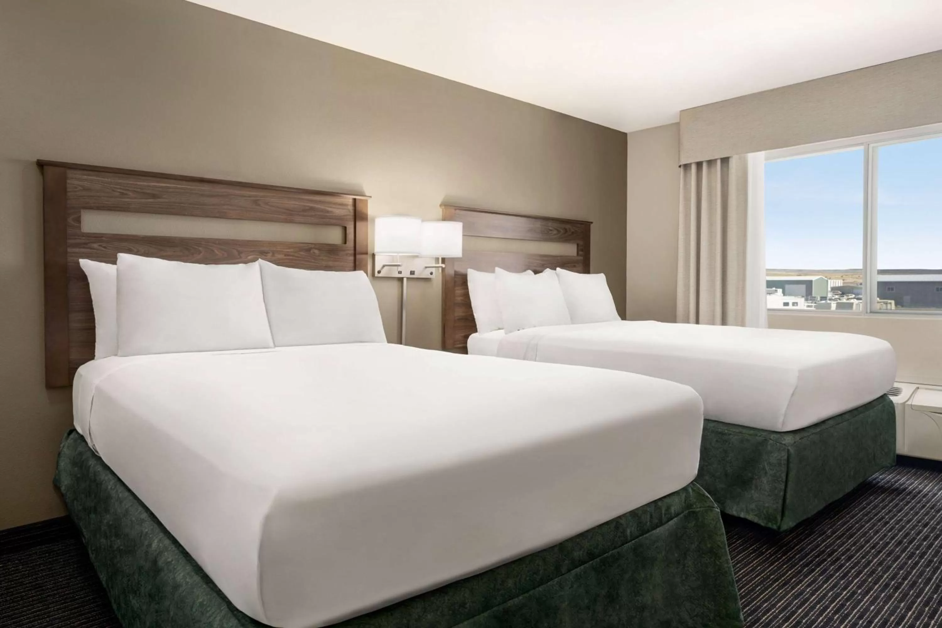 Photo of the whole room, Bed in Baymont by Wyndham Rawlins