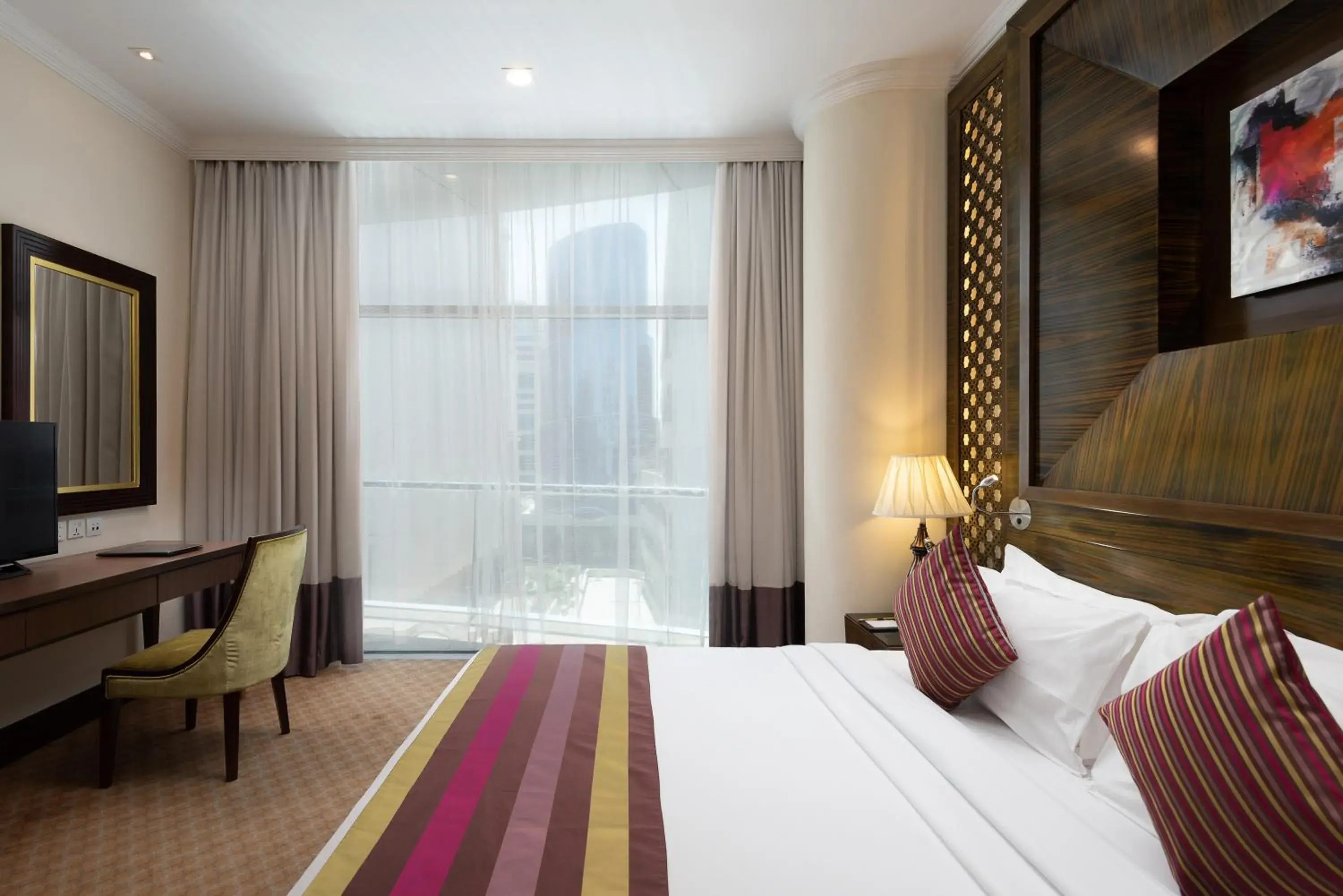 Bed in Landmark Premier Hotel