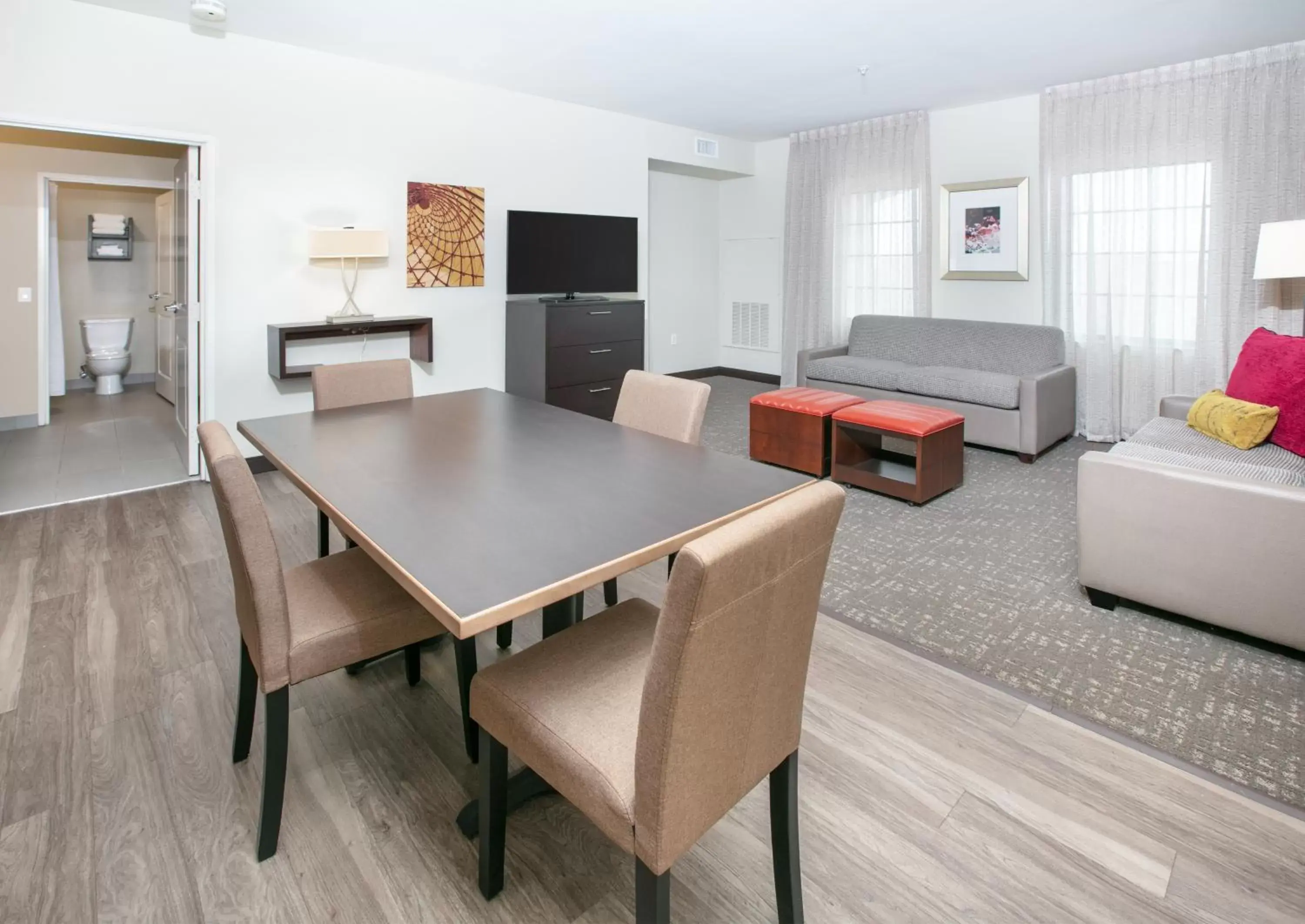 Living room, Dining Area in Staybridge Suites Plano - Richardson Area, an IHG Hotel
