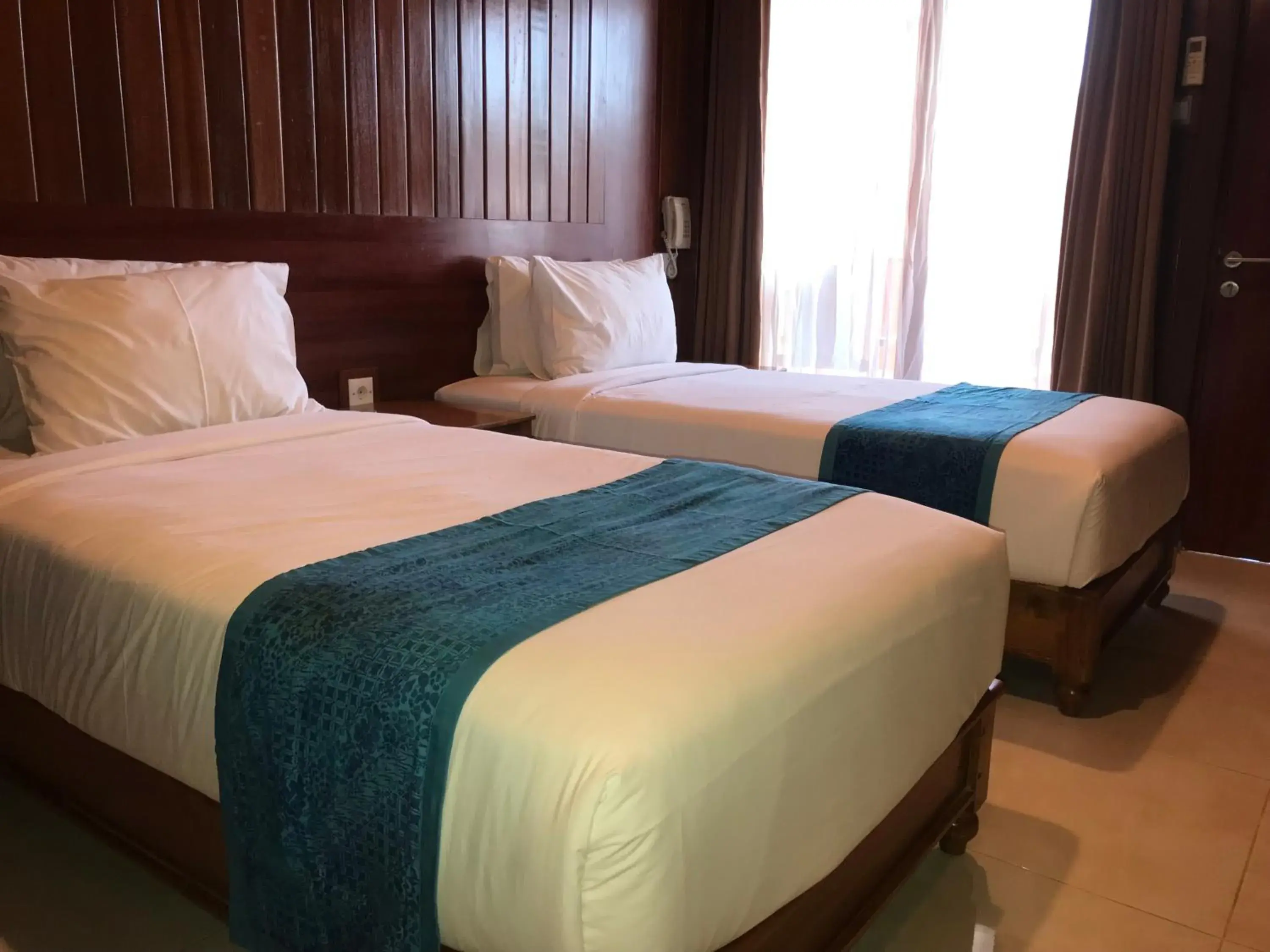 Bed in Seahouse Bali Indah Beach Inn