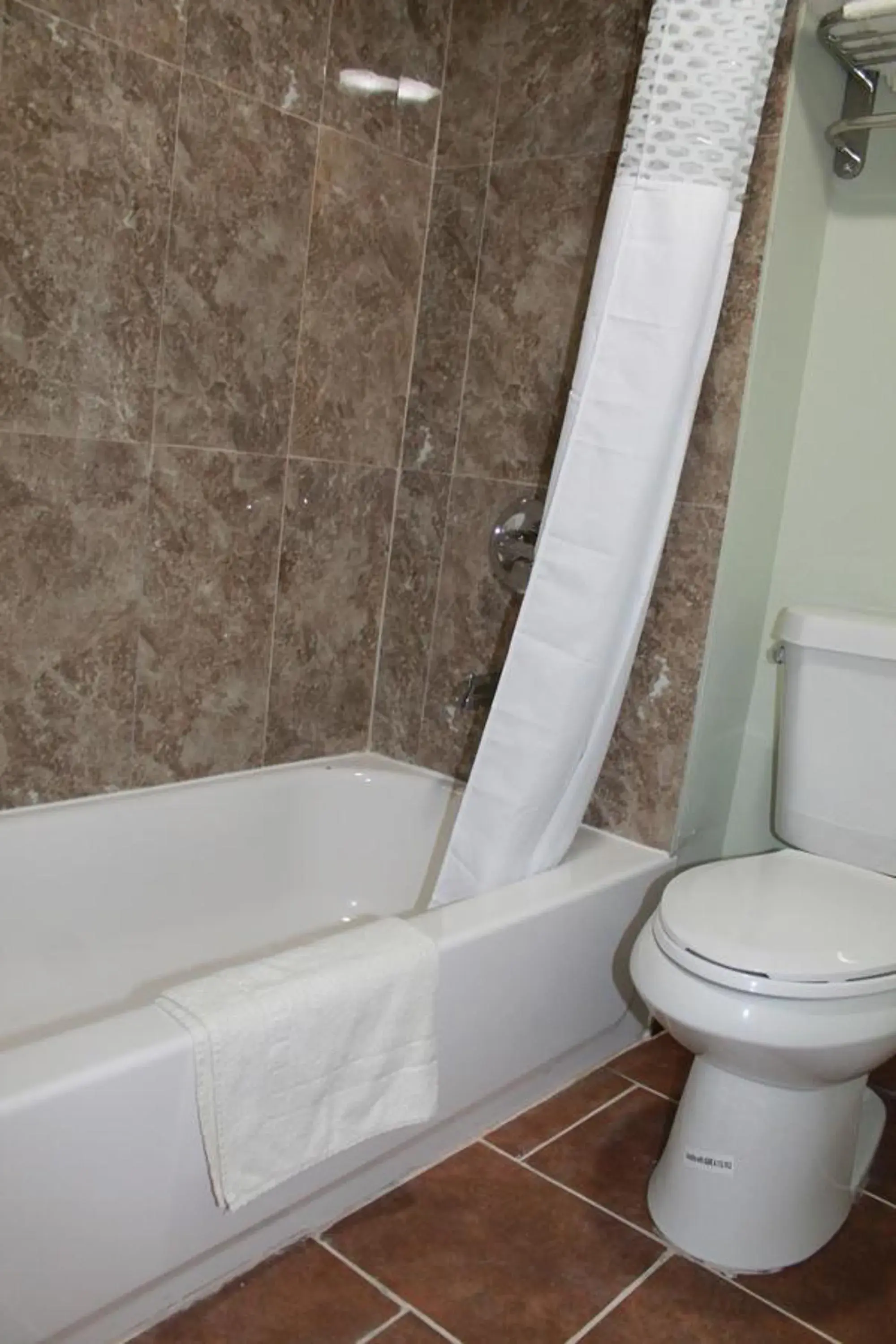 Shower, Bathroom in American Inn & Suites