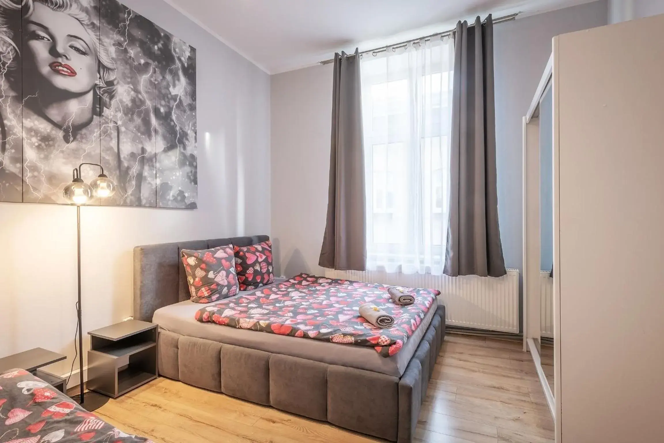 Bed in Queen Apartments Bed in Queen Apartments