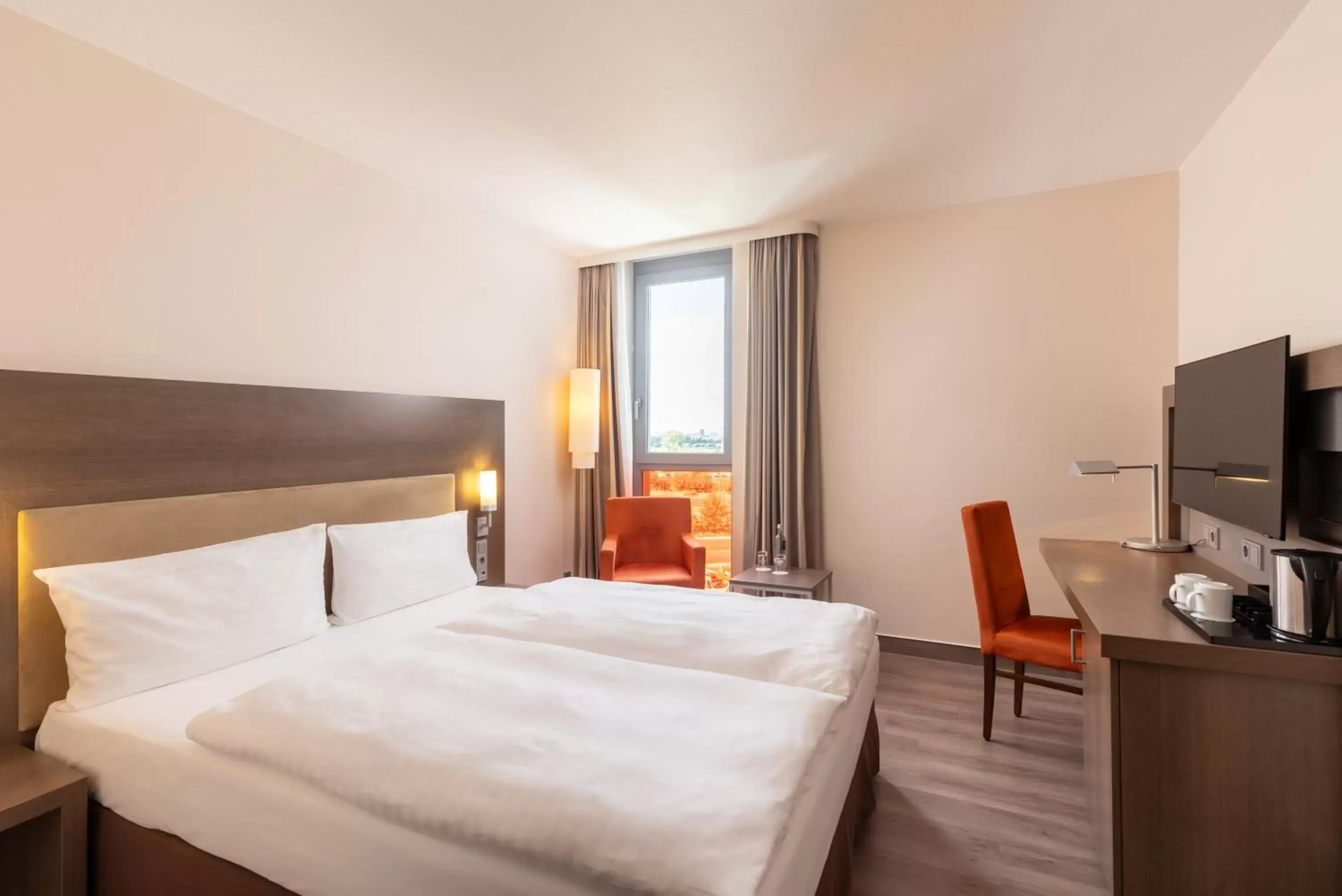 Photo of the whole room, Bed in IntercityHotel Berlin Airport Area North