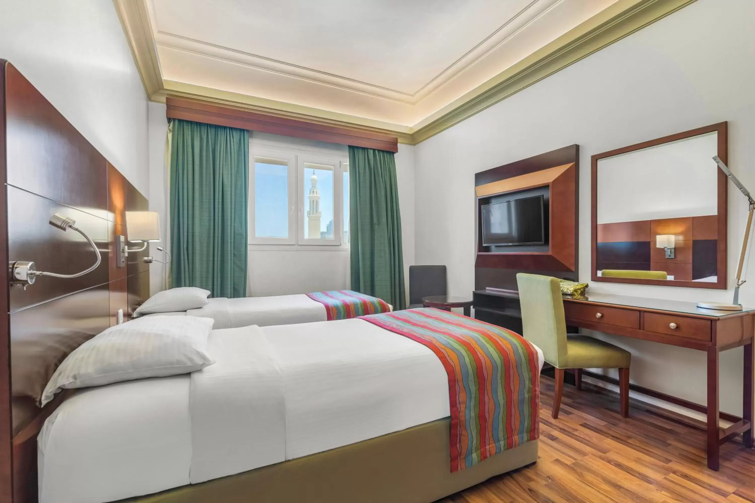 Bed, TV/Entertainment Center in Al Khoory Hotel Apartments Al Barsha