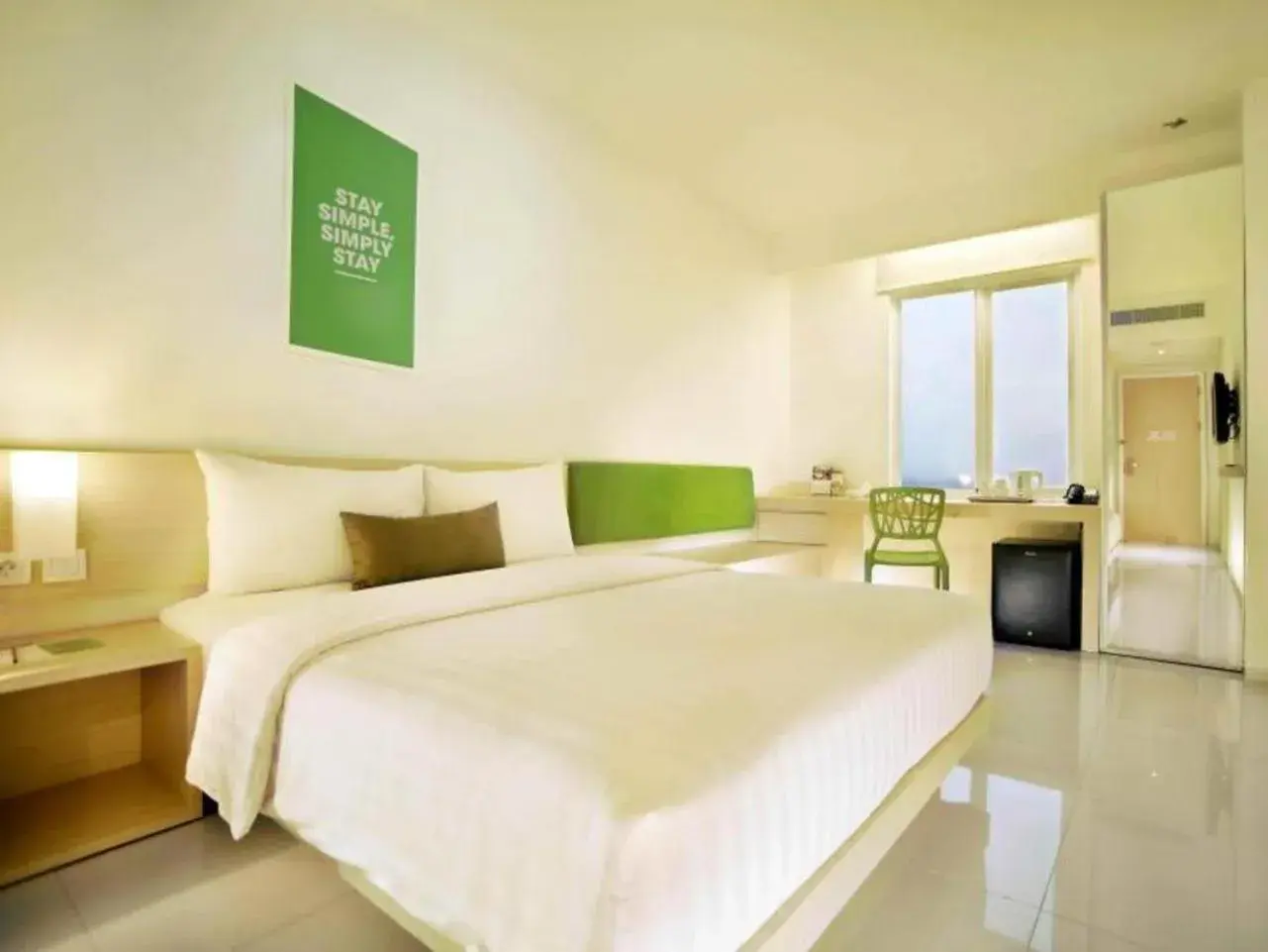 Bed in Zuri Express Lippo Cikarang Hotel