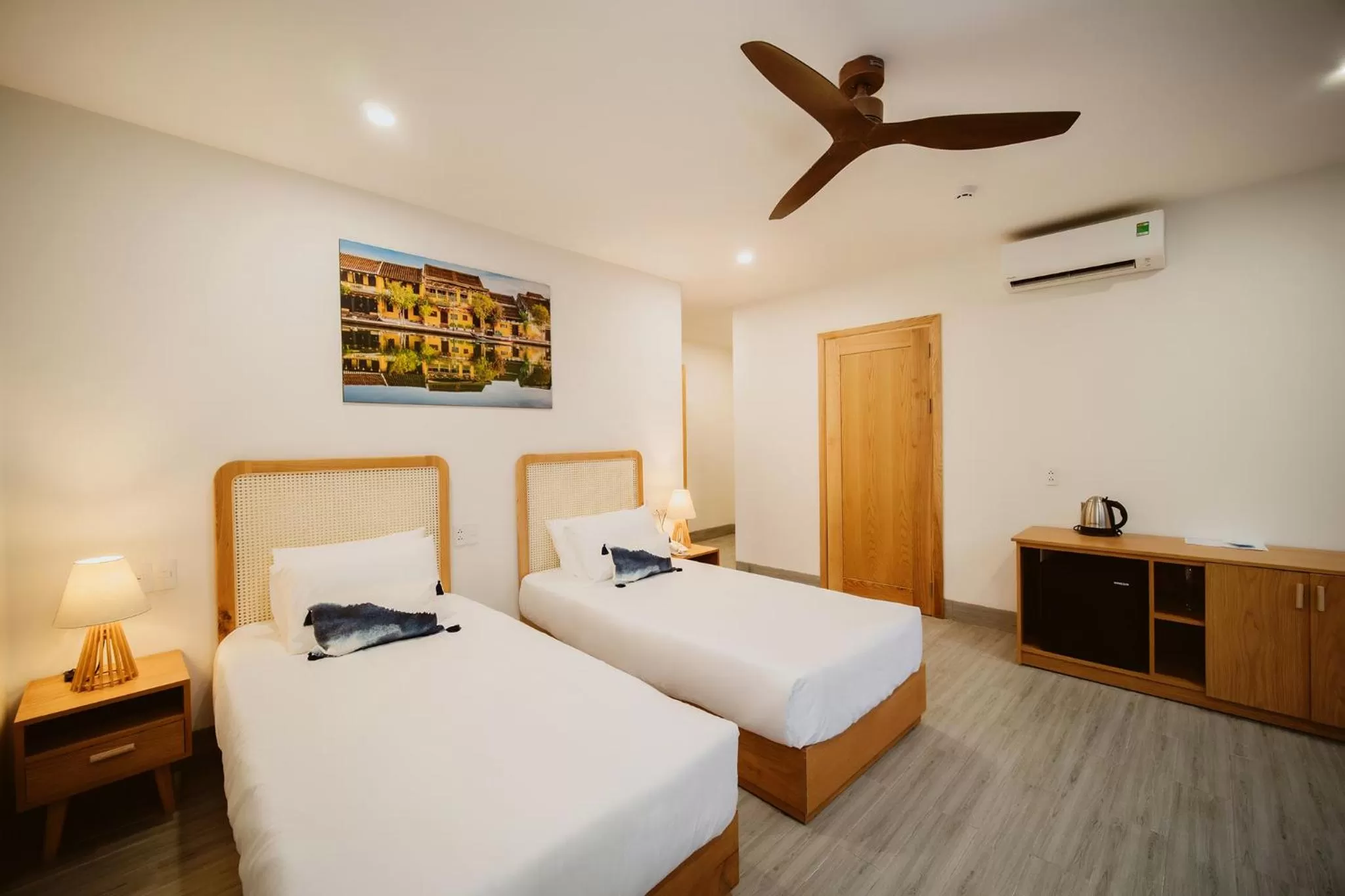 Bed in The Watermark Beachside Hotel