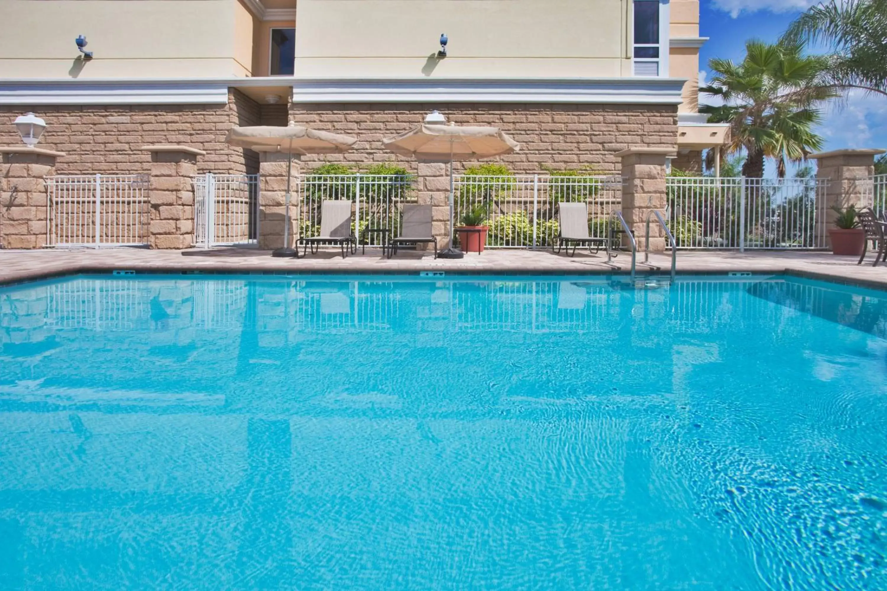 Property building, Swimming Pool in Holiday Inn Daytona Beach LPGA Boulevard, an IHG Hotel