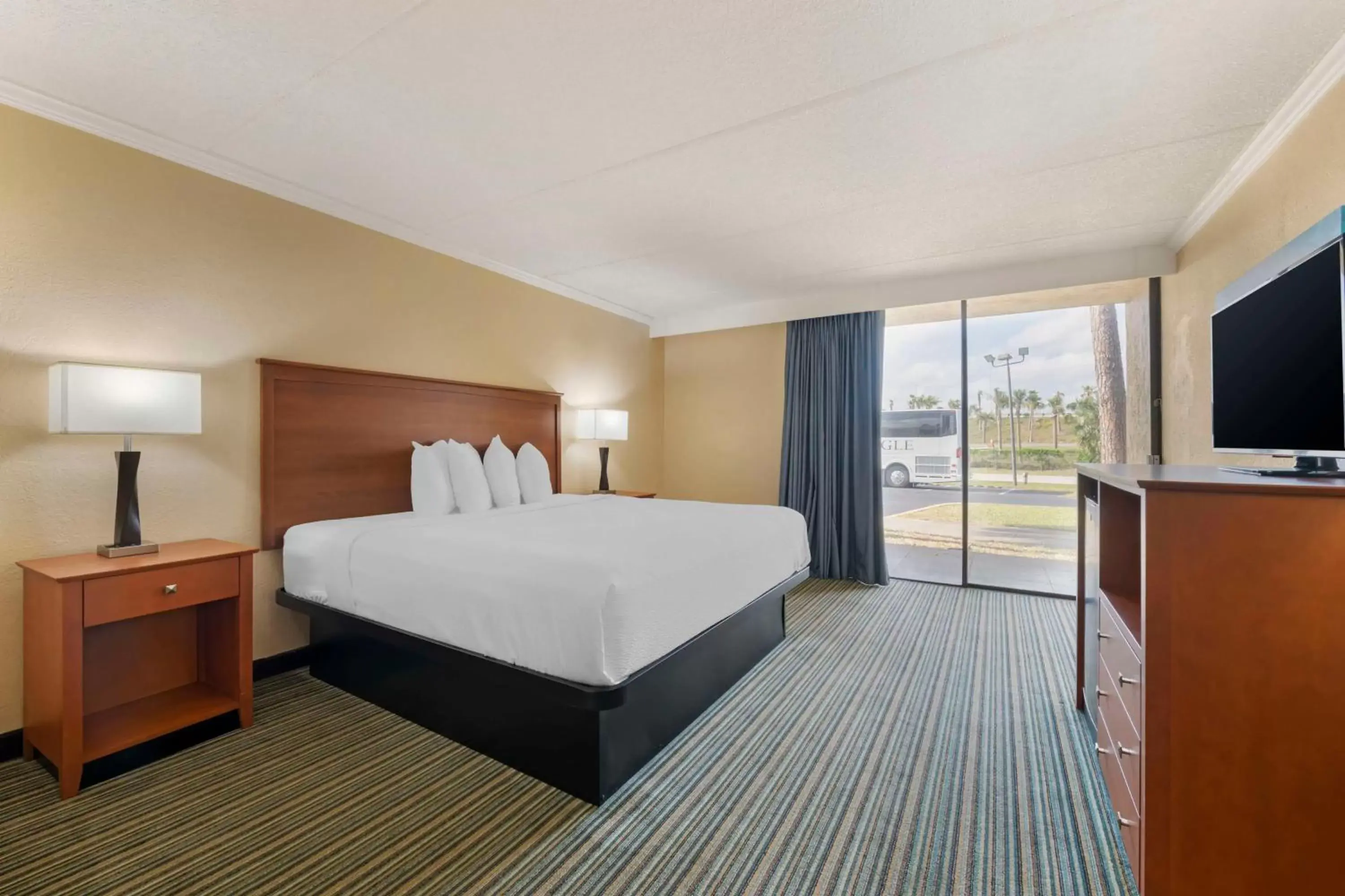 King Room with Roll-in Shower and Balcony - Non-Smoking/Disability Access in Best Western International Speedway Hotel King Room with Roll-in Shower and Balcony - Non-Smoking/Disability Access in Best Western International Speedway Hotel