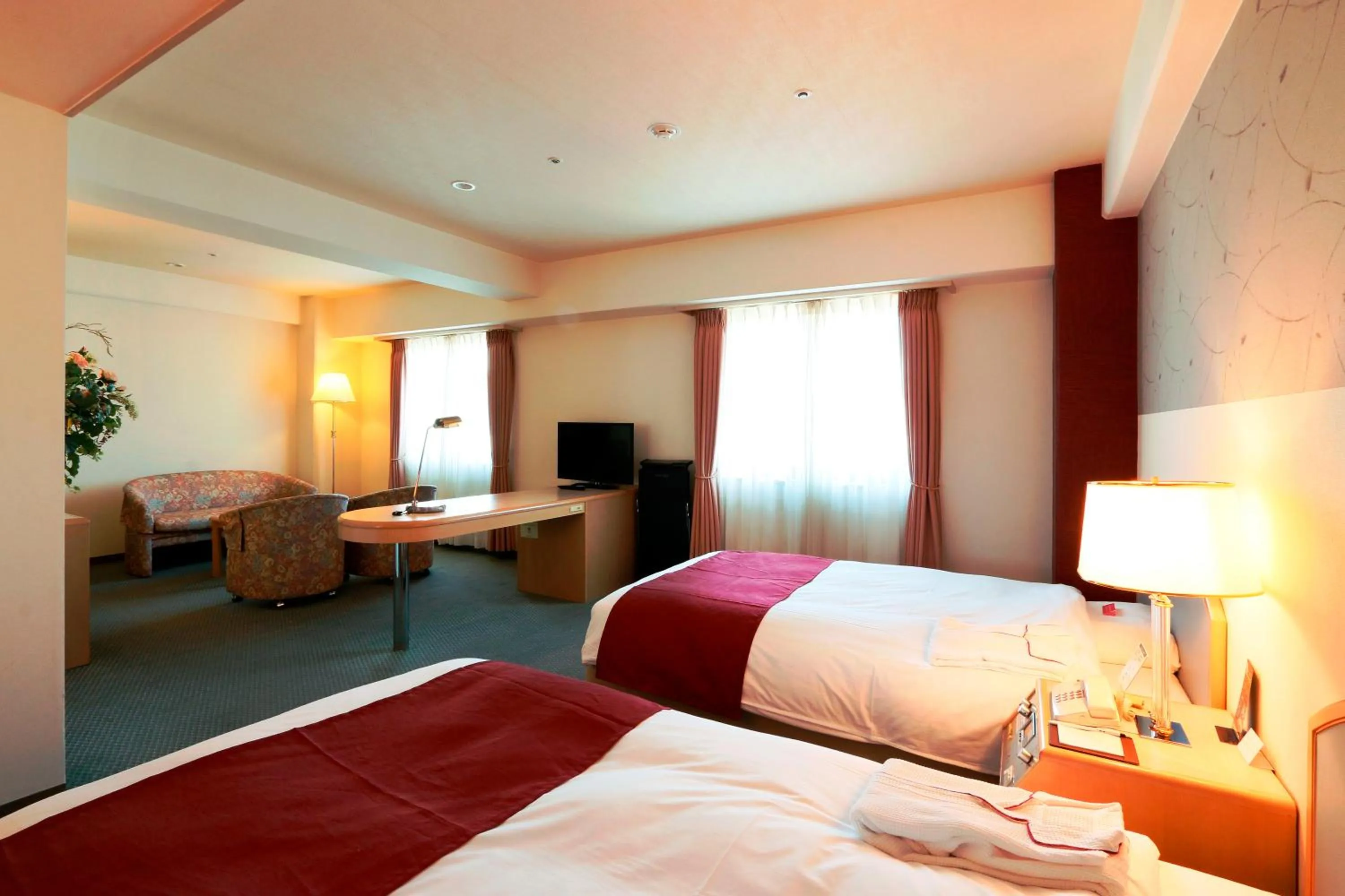 Photo of the whole room, Bed in Nest Hotel Matsuyama