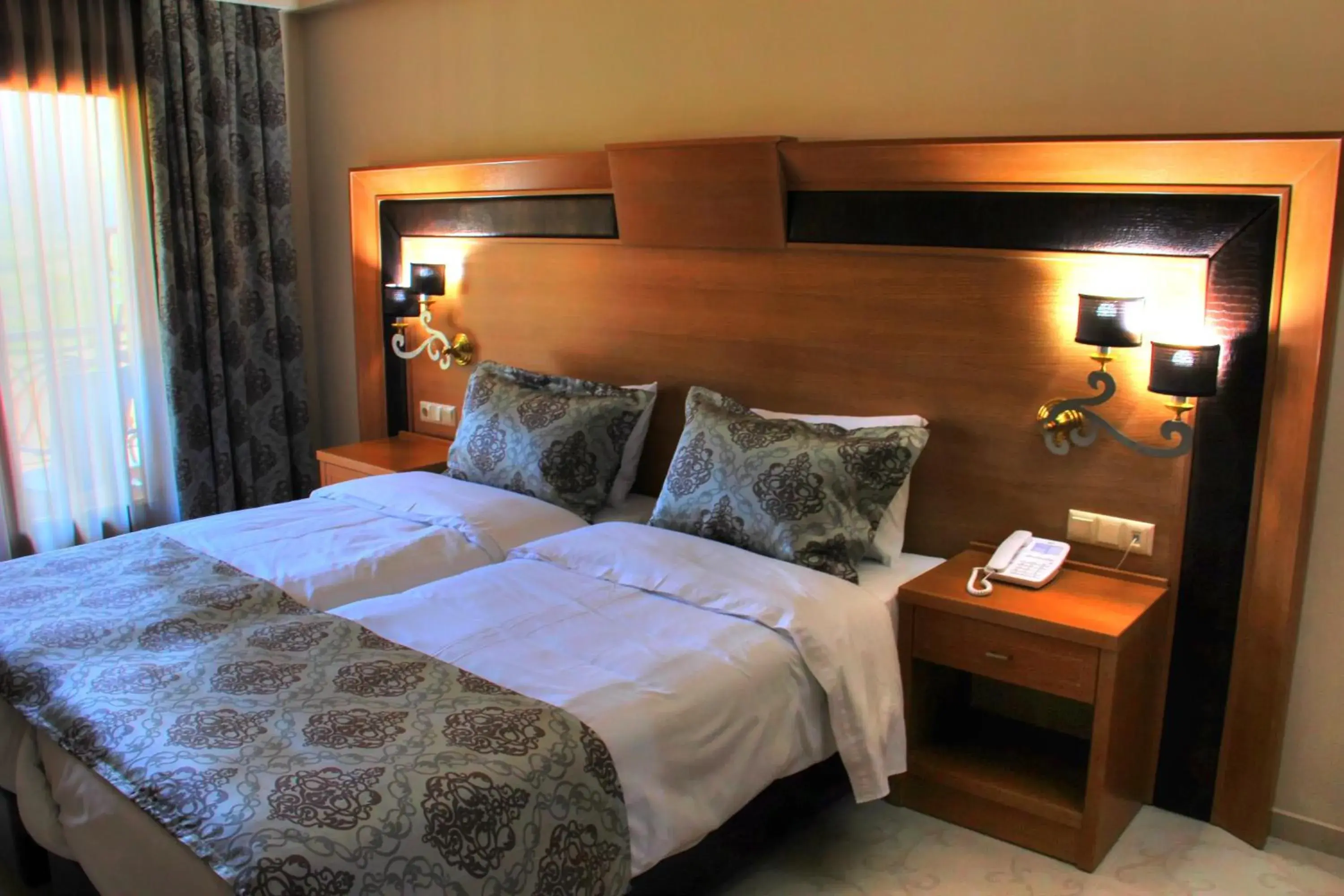 Bedroom, Bed in Grand Meteora Hotel Bedroom, Bed in Grand Meteora Hotel